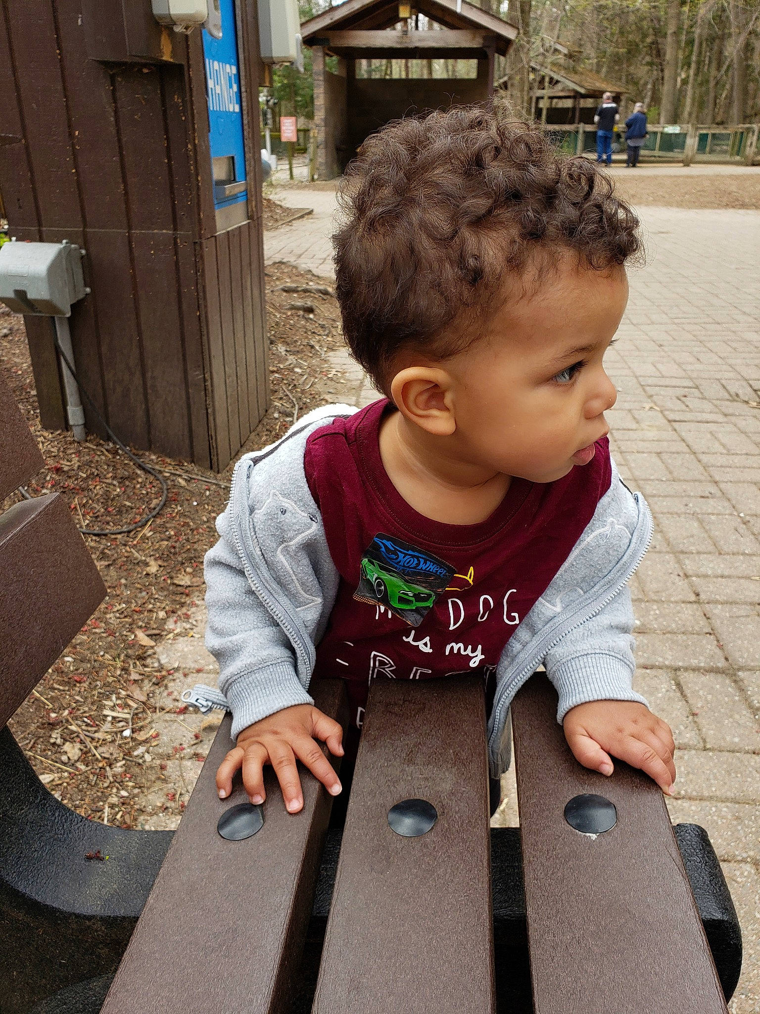 Lawton is registered to the contest to win money with this photo: child, person, play, sitting, toddler