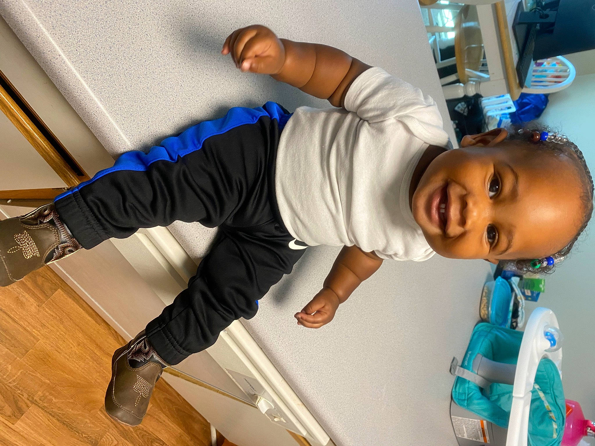 Kasen joined the competition — help win amazing prizes! baby, baby_toddler_clothing, child, comfort, elbow, flooring, fun, hardwood, human_leg, joint, joy, knee, person, room, shoulder, sleeve, smile, sportswear, sunglasses, t_shirt