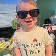 Ryker joined the competition — help win amazing prizes! toddler, child, sunglasses, smile, tshirt, indoor, toy, playroom, happy, face, person, clothing, home, young_child, cute, casual, portrait, short_hair, fun, baby