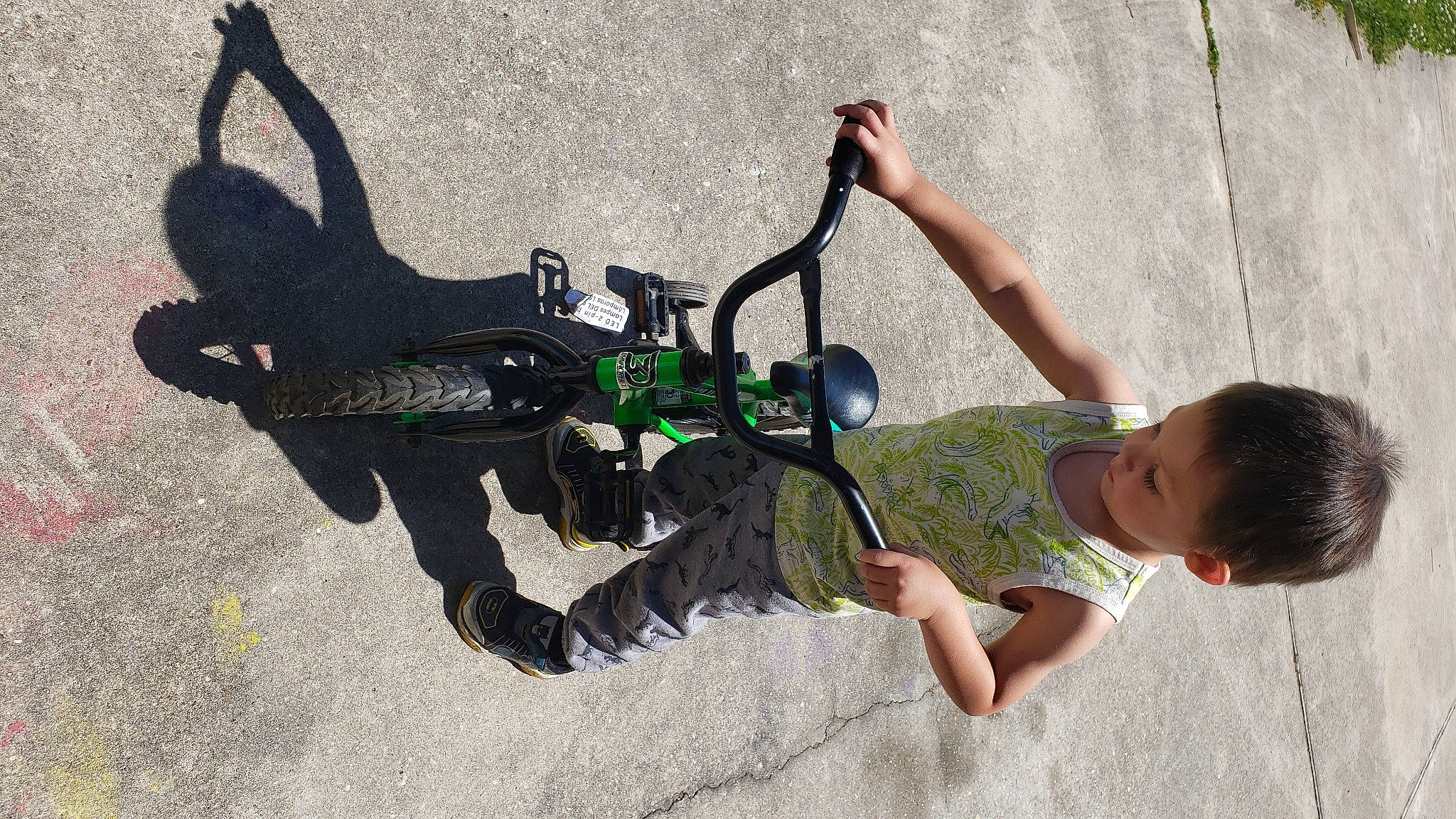 Keith is registered to the contest to win money with this photo: auto_part, automotive_tire, bicycle_accessory, bicycle_fork, bicycle_frame, bicycle_handlebar, bicycle_part, bicycle_tire, grass, leisure, machine, outdoor_recreation, person, personal_protective_equipment, radio_controlled_toy, recreation, rim, shorts, spoke, tire