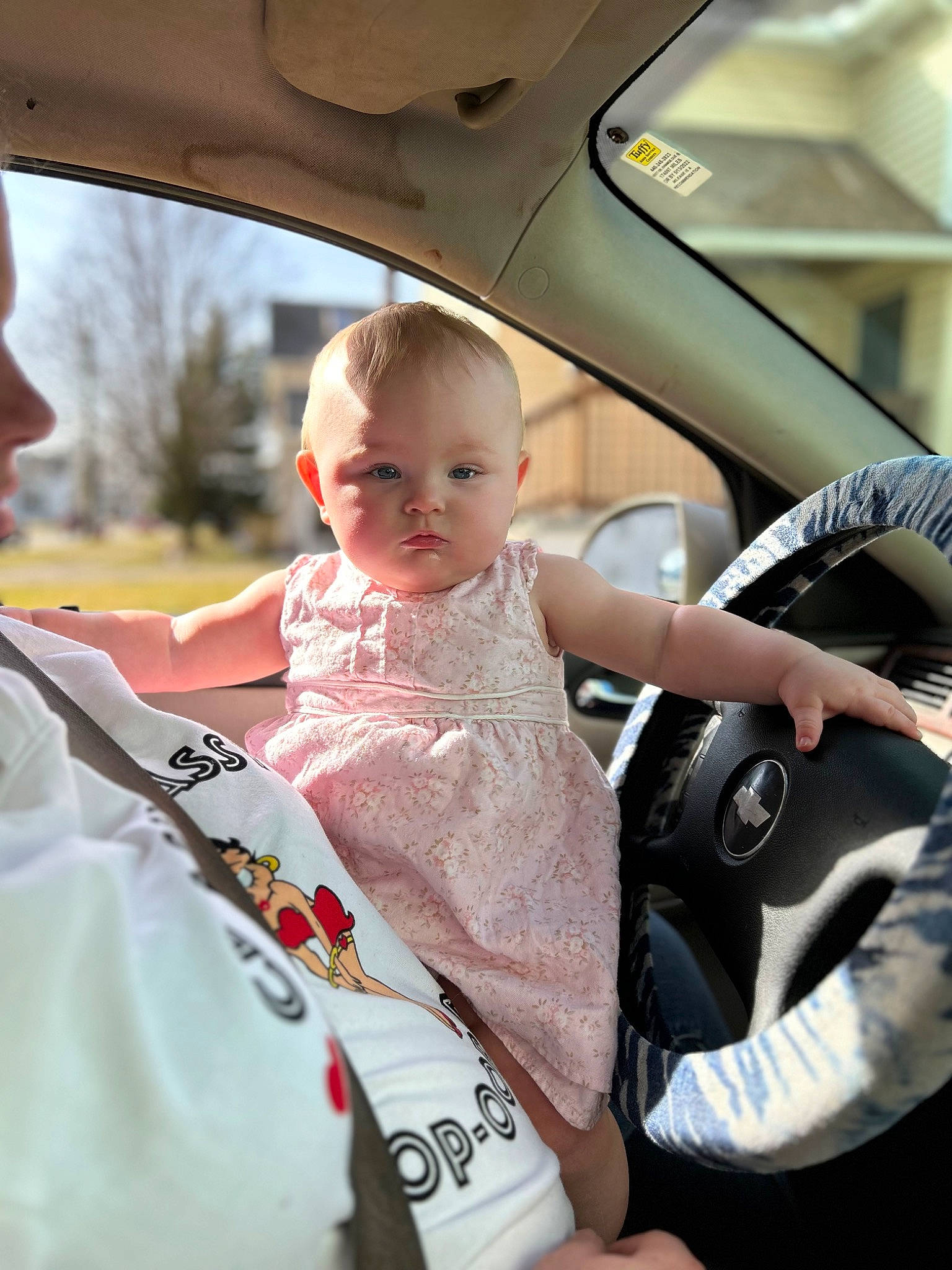 Sarah is registered to the contest to win money with this photo: auto_part, automotive_design, automotive_exterior, baby, baby_carriage, baby_products, baby_toddler_clothing, car, car_seat, child, family_car, fun, happy, luxury_vehicle, motor_vehicle, person, personal_luxury_car, smile, steering_wheel, toddler