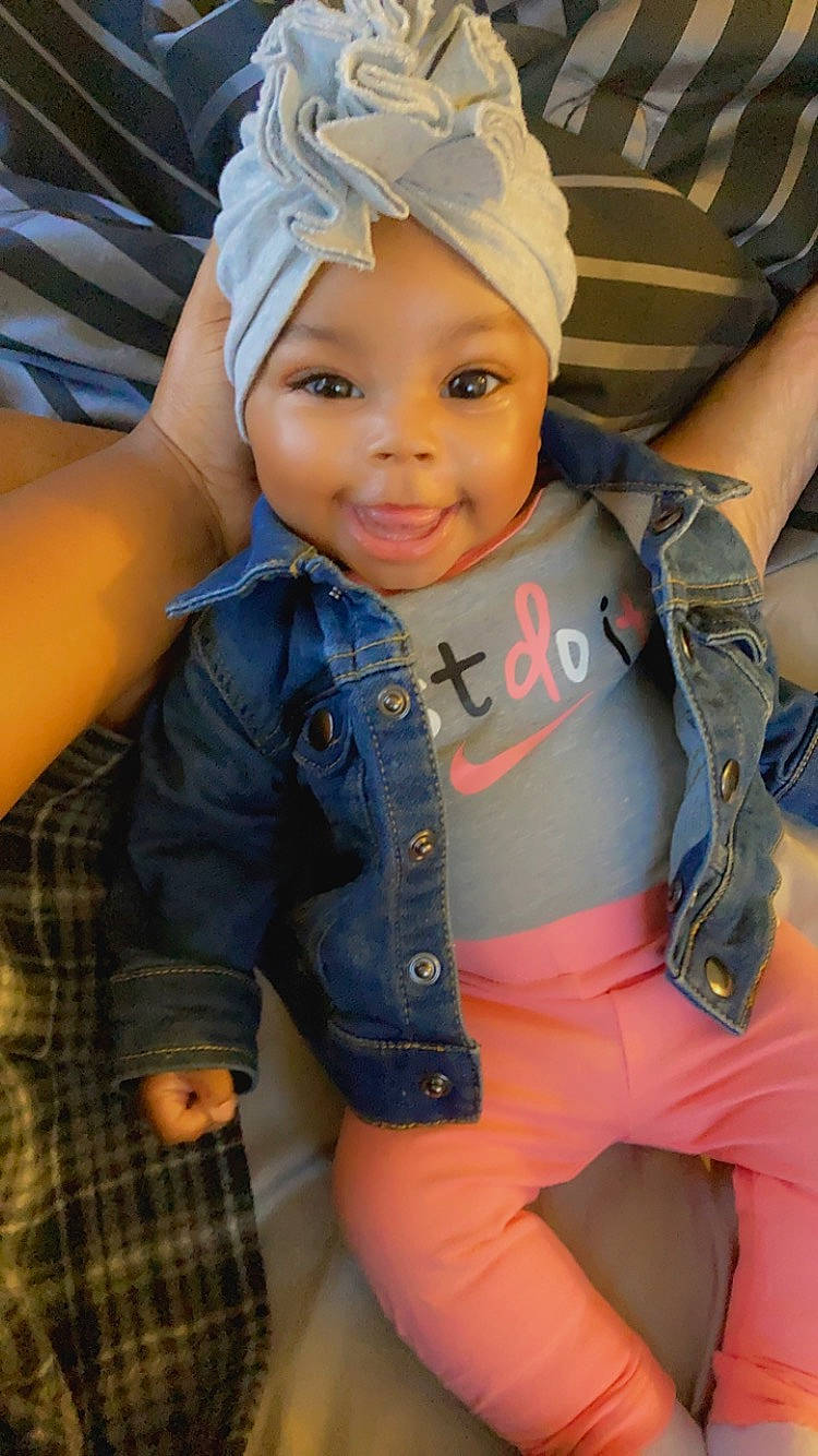 Treasure is registered to the contest to win money with this photo: baby_toddler_clothing, baseball_cap, cap, chin, clothing, cool, electric_blue, eye, finger, fun, happy, head, headwear, leisure, lip, outerwear, person, skin, sleeve, smile