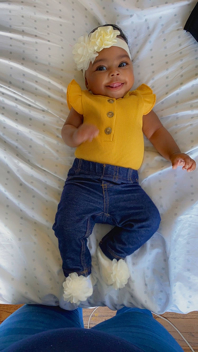 Treasure is registered to the contest to win money with this photo: baby, baby_toddler_clothing, blue, cap, child, comfort, fun, happy, head, headwear, knee, organ, person, pink, sleeve, smile, snapshot, standing, textile, toddler