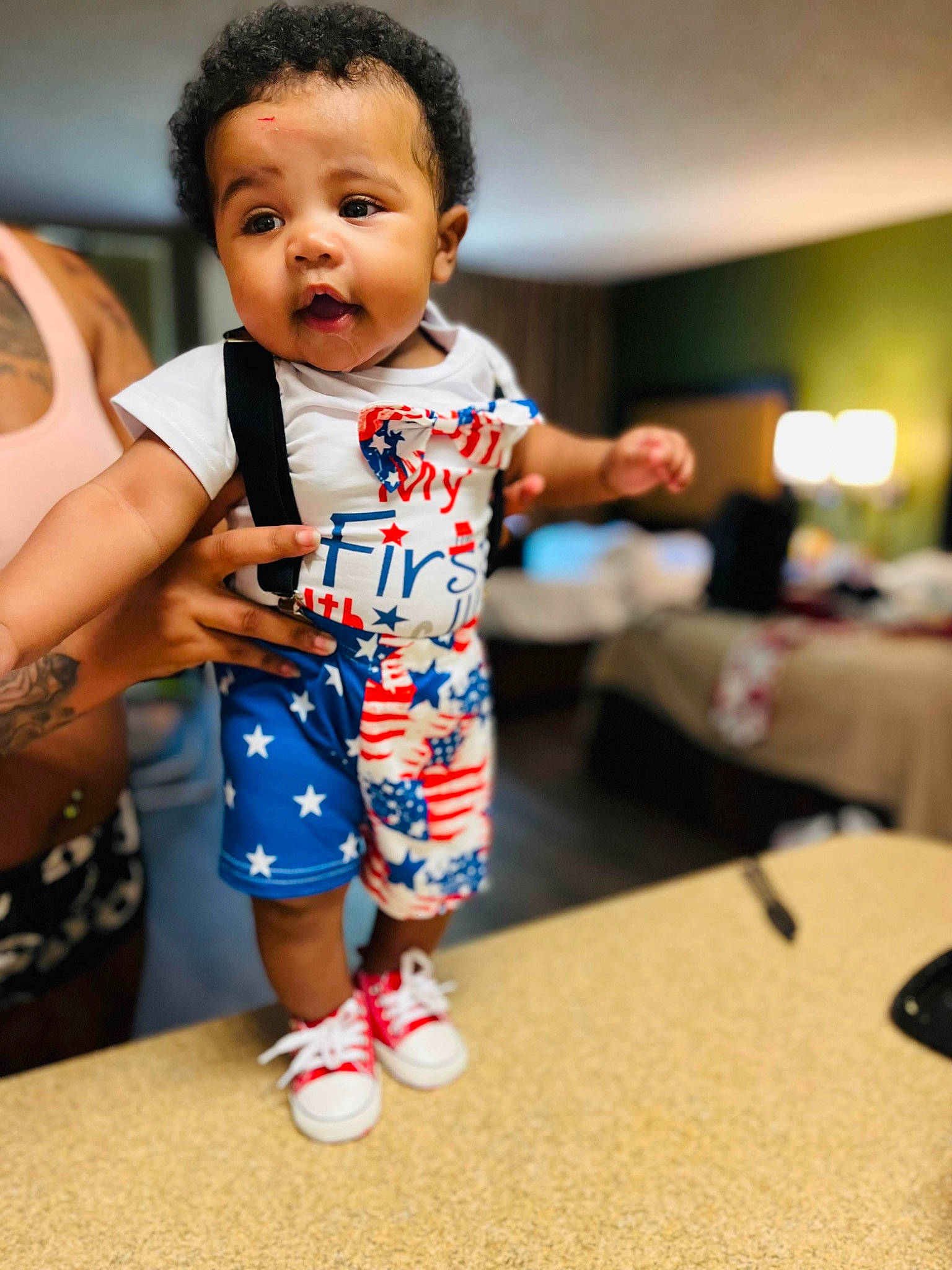 Koda joined the competition — help win amazing prizes! arm, baby, baby_toddler_clothing, child, electric_blue, event, finger, flash_photography, flooring, fun, gesture, hand, happy, leisure, person, room, sitting, sleeve, smile, thumb