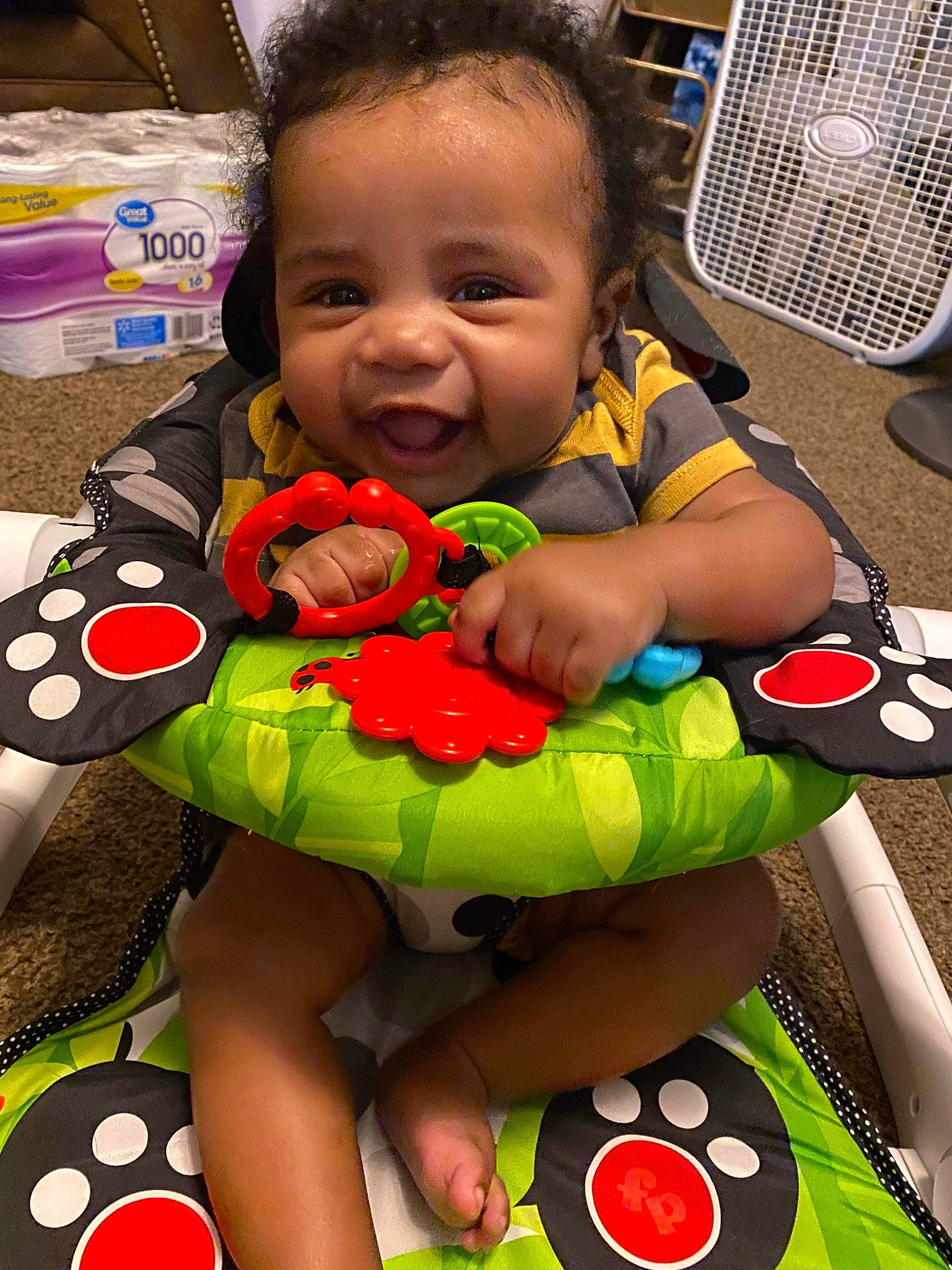 Koda is registered to the contest to win money with this photo: baby, baby_products, baby_toddler_clothing, black, cheek, child, eye, face, fun, green, happy, head, person, product, sitting, skin, smile, snapshot, stuffed_toy, toddler