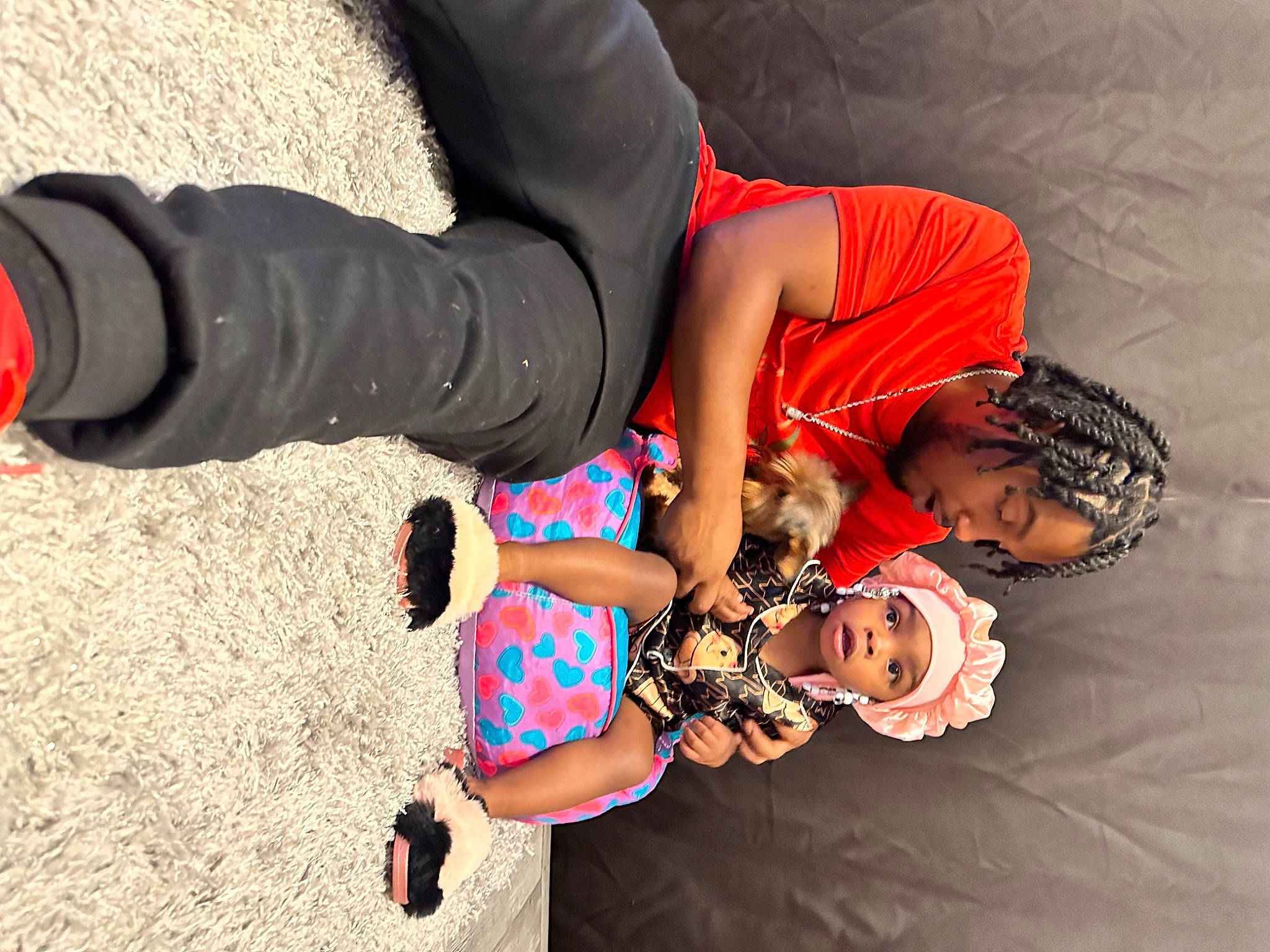 Kayoni is registered to the contest to win money with this photo: abdomen, child, elbow, entertainment, event, finger, flash_photography, fun, gesture, hand, happy, headwear, human_leg, jewellery, knee, leisure, person, sitting, thigh, toddler