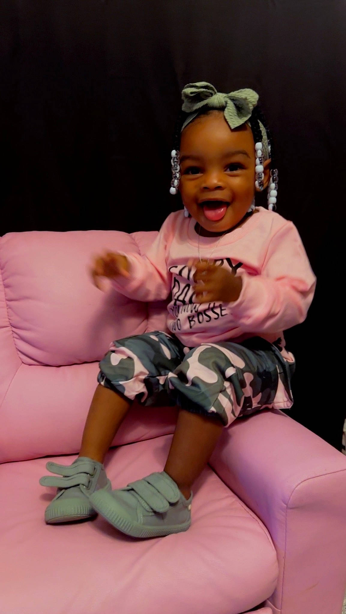 Kayoni is registered to the contest to win money with this photo: baby_toddler_clothing, comfort, face, finger, flash_photography, goggles, happy, knee, lap, leg, person, pink, product, purple, shoe, skin, smile, sock, sunglasses, thigh