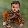 Elijah joined the competition — help win amazing prizes! toddler, child, crawling, orange_pants, checkered_shirt, white_shoes, wooden_floor, green_background, indoor, cute, curious, person, baby, portrait, hands, face, young, exploring, clothing, floor