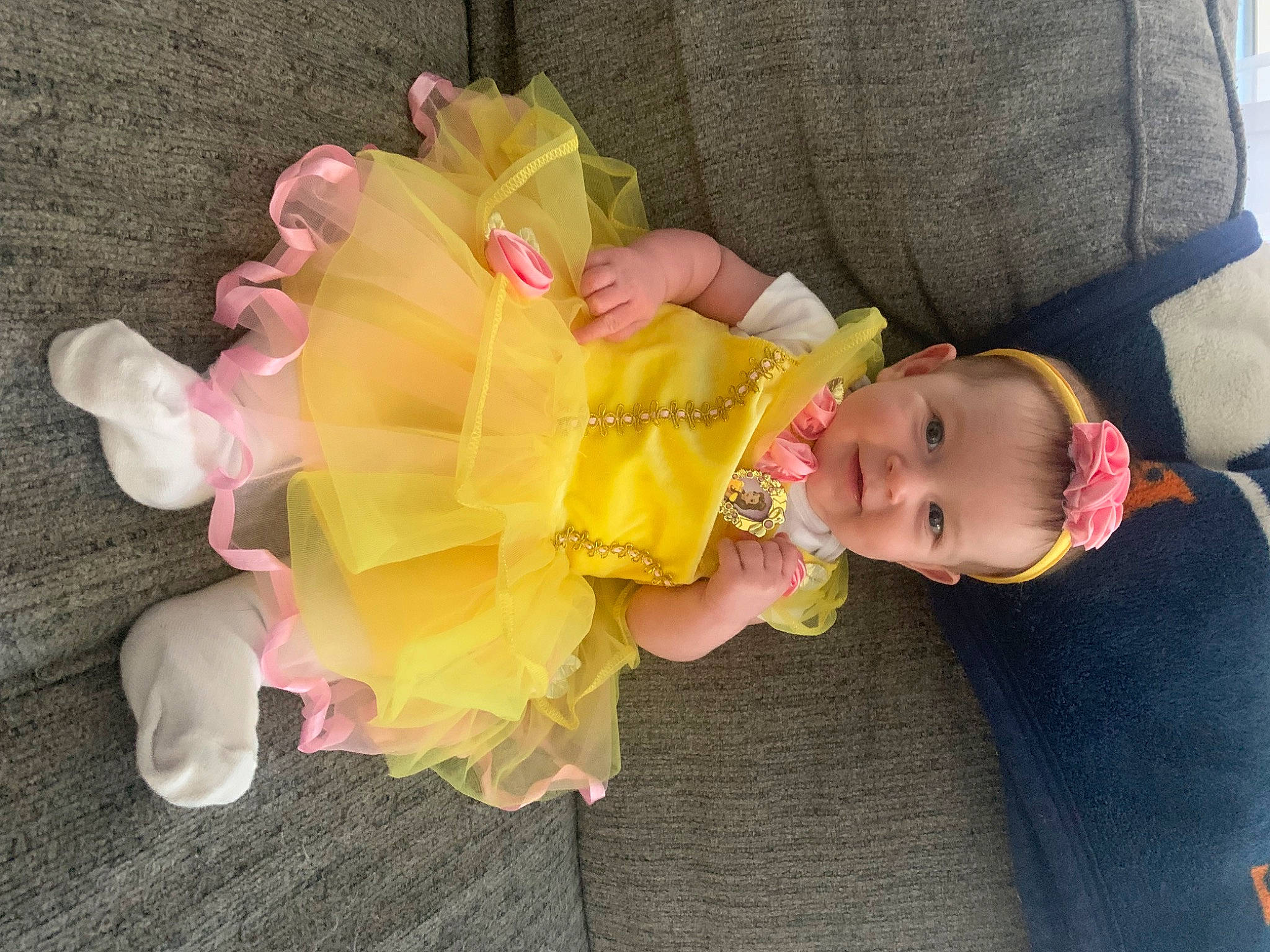 Anna is registered to the contest to win money with this photo: baby, baby_products, baby_toddler_clothing, child, comfort, fashion_accessory, fun, headgear, headpiece, magenta, mythical_creature, paper_product, party_supply, peach, person, petal, pink, plastic, product, toddler
