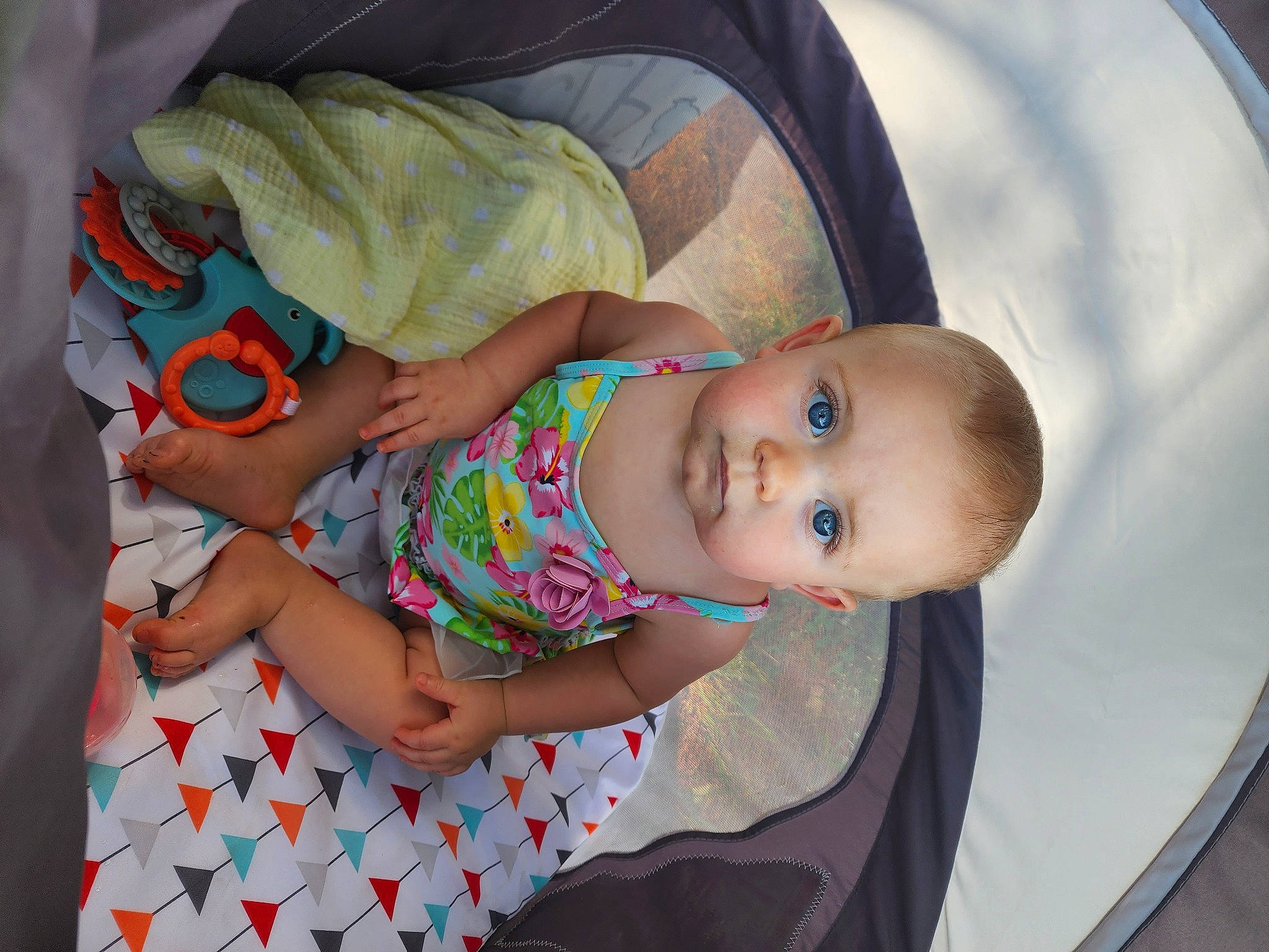 Liberty is registered to the contest to win money with this photo: arm, baby, baby_carriage, baby_products, baby_safety, baby_toddler_clothing, cheek, child, comfort, happy, hat, human_body, nail, pattern, person, room, sitting, skin, sleeve, smile