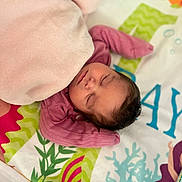 Alona joined the competition — help win amazing prizes! baby, sleeping, blanket, pink, mat, colorful, pattern, aquatic, soft, peaceful, infant, child, resting, cute, portrait, indoors, cozy, clothing, head, face