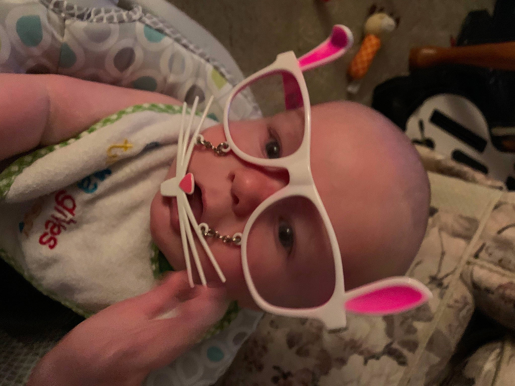 Asher is registered to the contest to win money with this photo: audio_equipment, drinkware, eyelash, eyewear, finger, goggles, health_care, helmet, medical, medical_equipment, medical_procedure, nail, patient, personal_protective_equipment, pink, service, sunglasses, thumb, vision_care, wrist