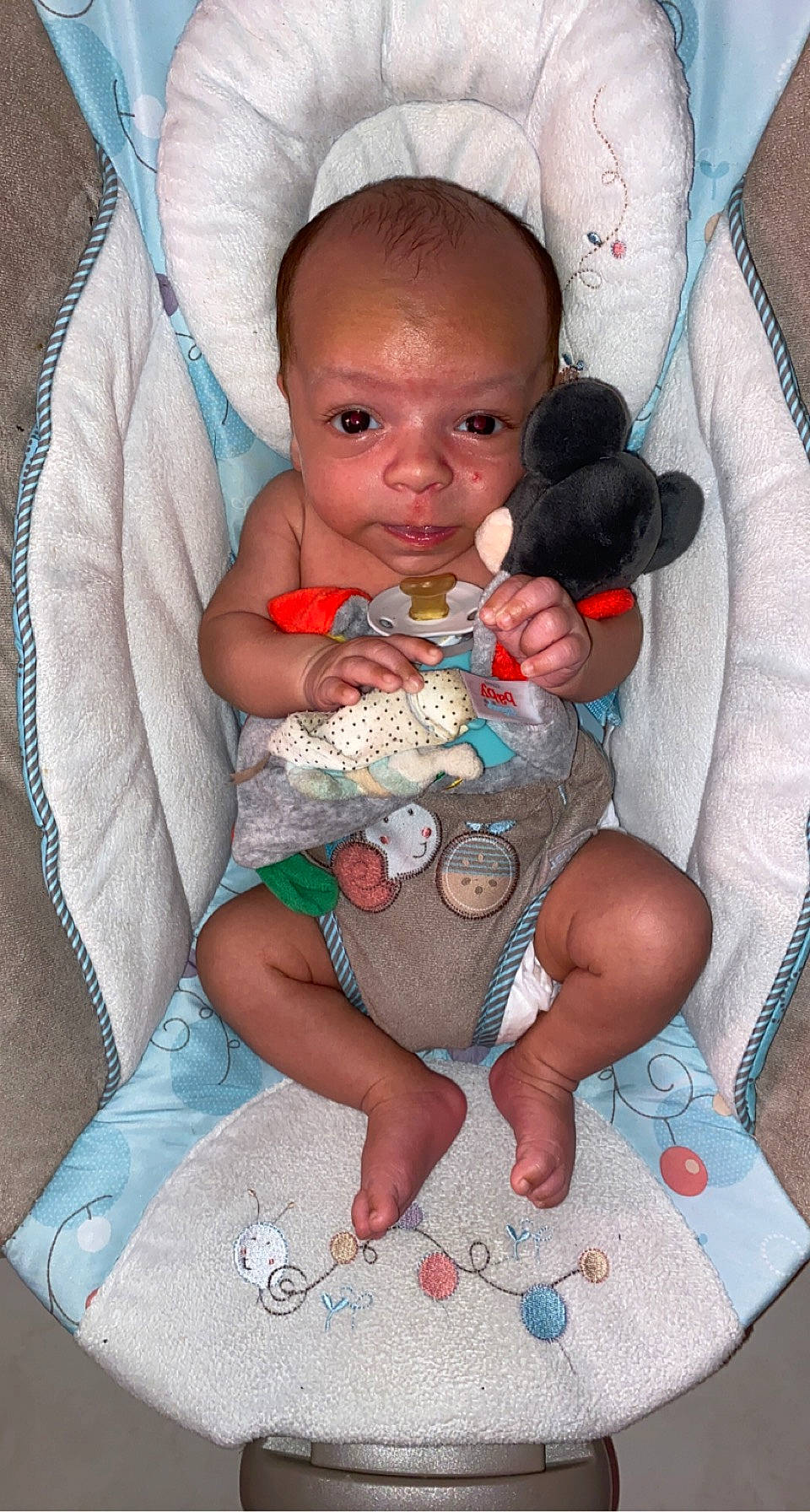 Mayron participe au concours pour gagner de l'argent avec cette photo : arm, baby, baby_products, baby_toddler_clothing, cheek, child, comfort, eye, finger, happy, head, iris, lap, linens, nail, person, pink, skin, sleeve, textile