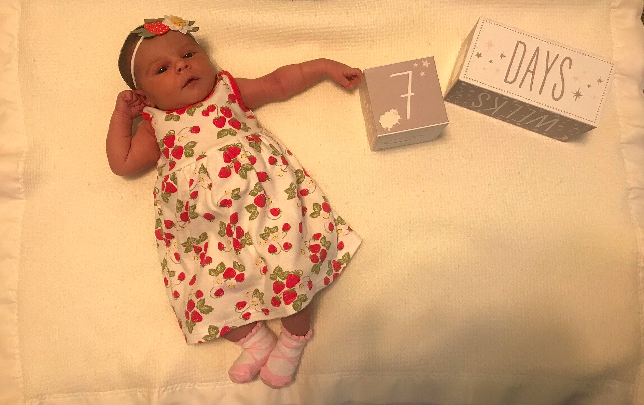 Alaia joined the competition — help win amazing prizes! baby, baby_toddler_clothing, child, fashion_design, finger, foot, fun, happy, head, headwear, house, human_leg, linens, one_piece_garment, pattern, peach, person, sandal, sleeve, toddler