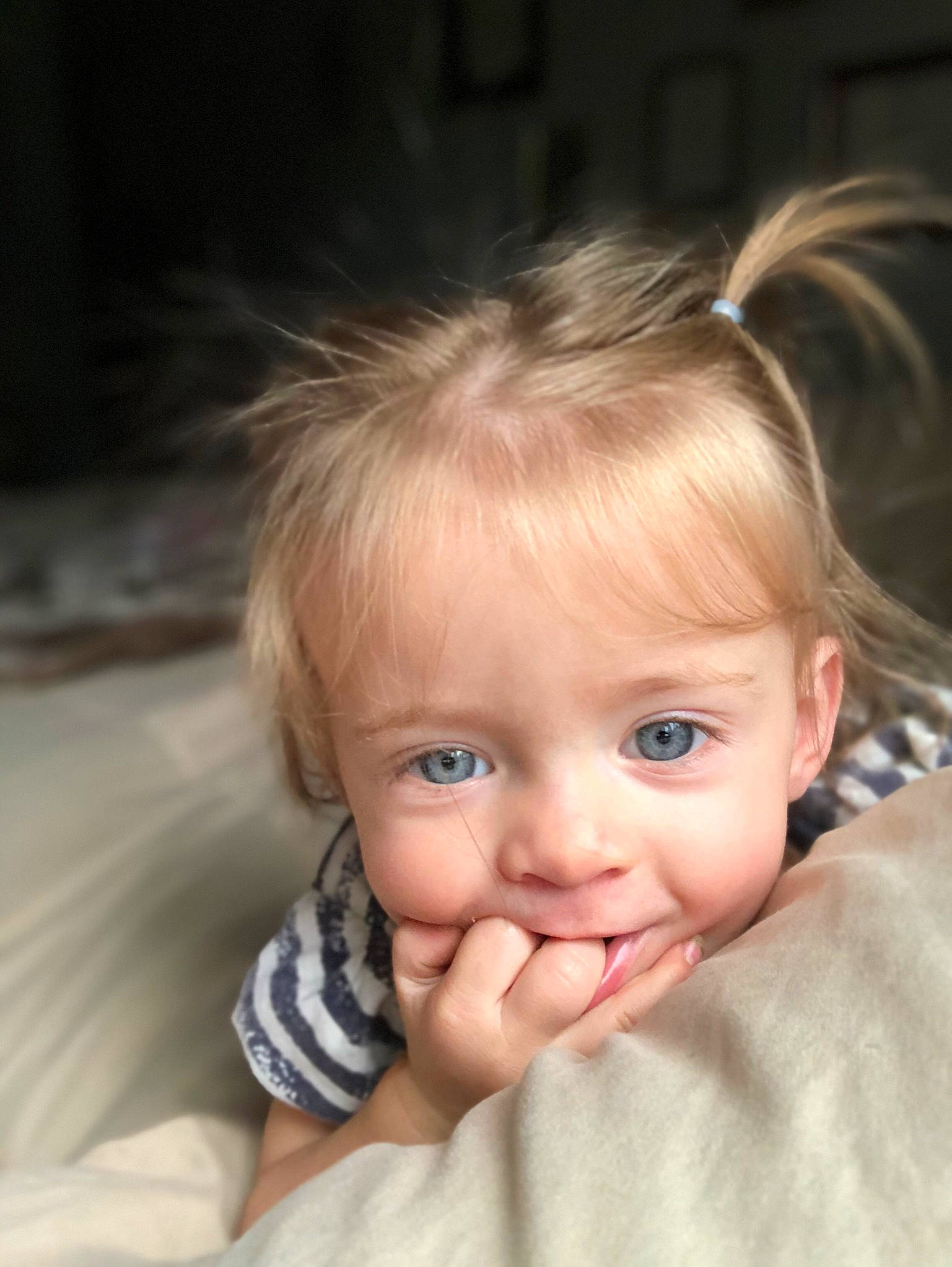 Kaylyn is registered to the contest to win money with this photo: baby, blond, cheek, chin, ear, eye, eyelash, face, flash_photography, gesture, hand, happy, head, iris, lip, nose, person, skin, smile, thumb