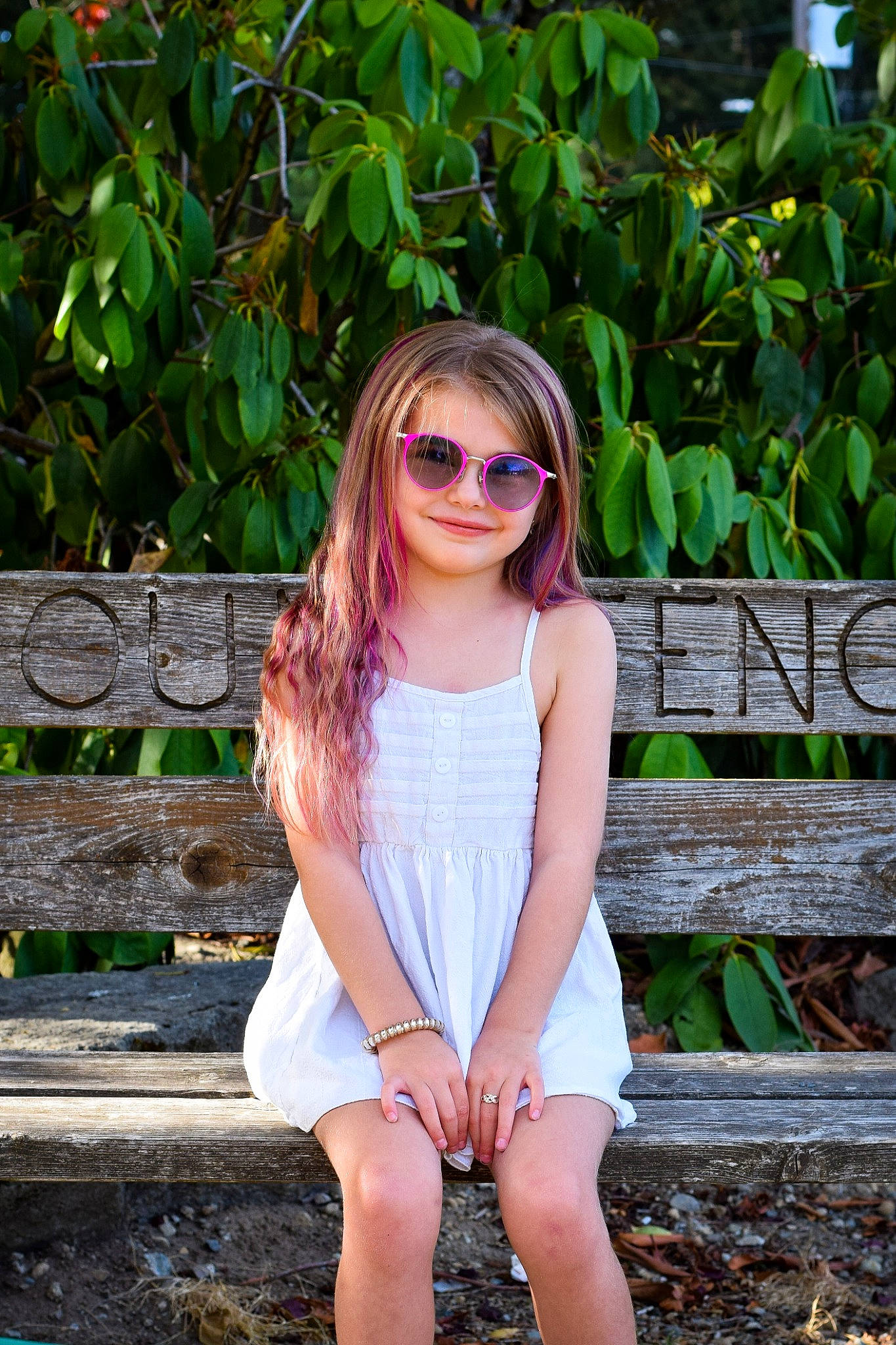 Harlee is registered to the contest to win money with this photo: beauty, botany, clothing, eyewear, face, fashion, glasses, grass, green, joy, lip, long_hair, person, photograph, photography, pink, shorts, shoulder, summer, sunglasses