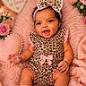 baby, child, infant, portrait, smiling, sitting, bow, headband, leopard_print, outfit, pink, blanket, fluffy, flowers, roses, heart, decor, cozy, indoor, photography