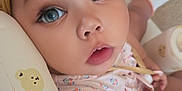 Katalaya joined the competition — help win amazing prizes! adorable, baby, bear_prints, blue_eyes, child, closeup, curious, cute, expression, face, headwear, indoor, infant, patterned_clothing, portrait, sitting, skin, soft_toys, yellow_bow, young_child