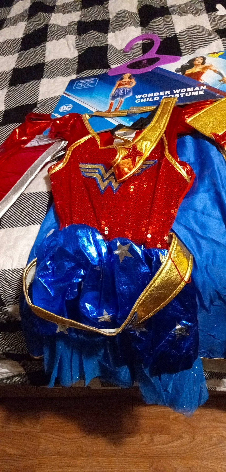 Kathryn is registered to the contest to win money with this photo: bag, carmine, costume, costume_design, electric_blue, event, fashion_accessory, fashion_design, fictional_character, jewellery, pattern, person, personal_protective_equipment, plastic, silk, sleeve, sportswear, uniform, visual_arts