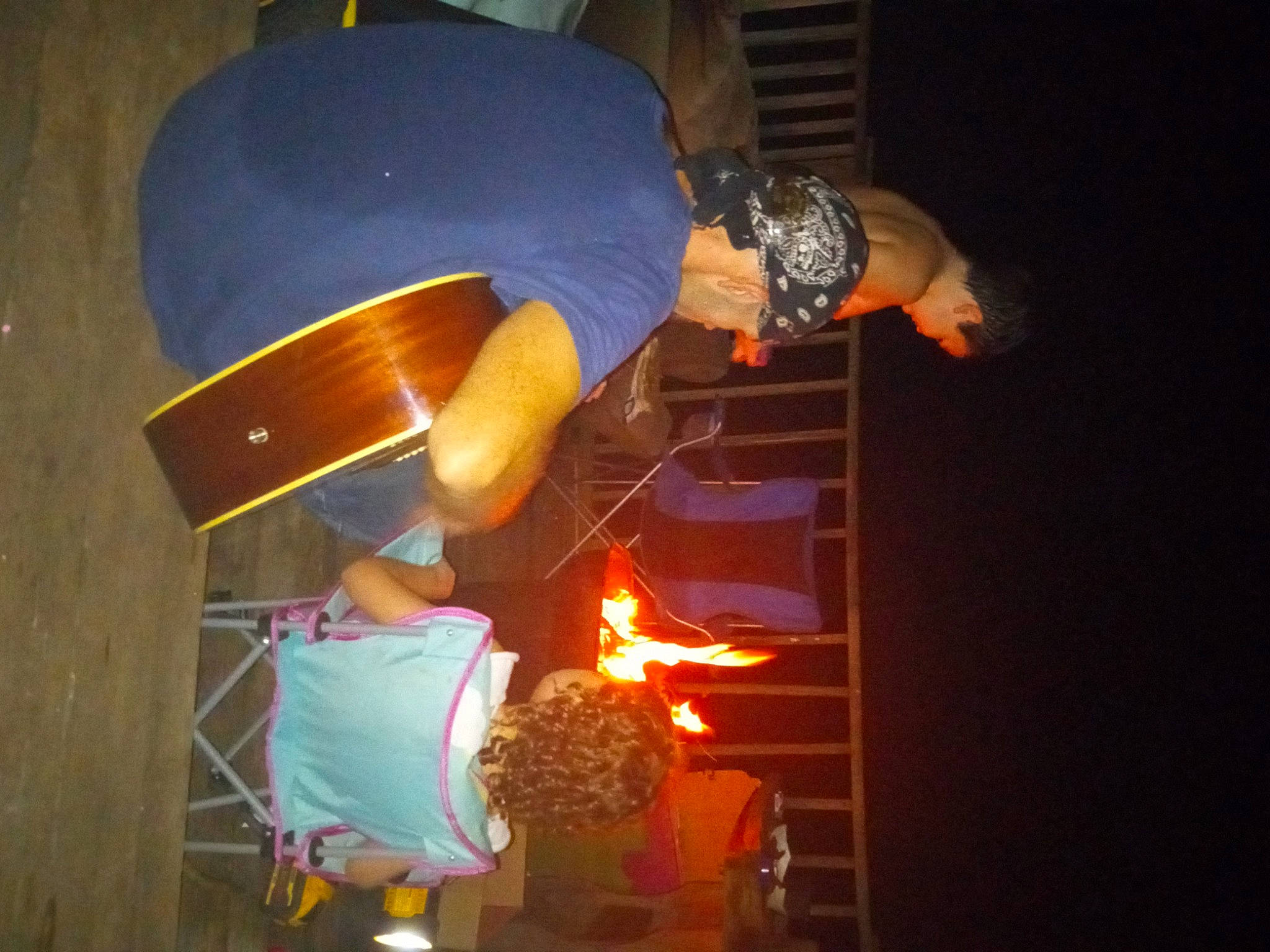 Nevaeh joined the competition — help win amazing prizes! chair, darkness, elbow, entertainment, event, fire, flame, fun, gas, heat, music, musician, night, performance, performance_art, performing_arts, person, room, table, wrist