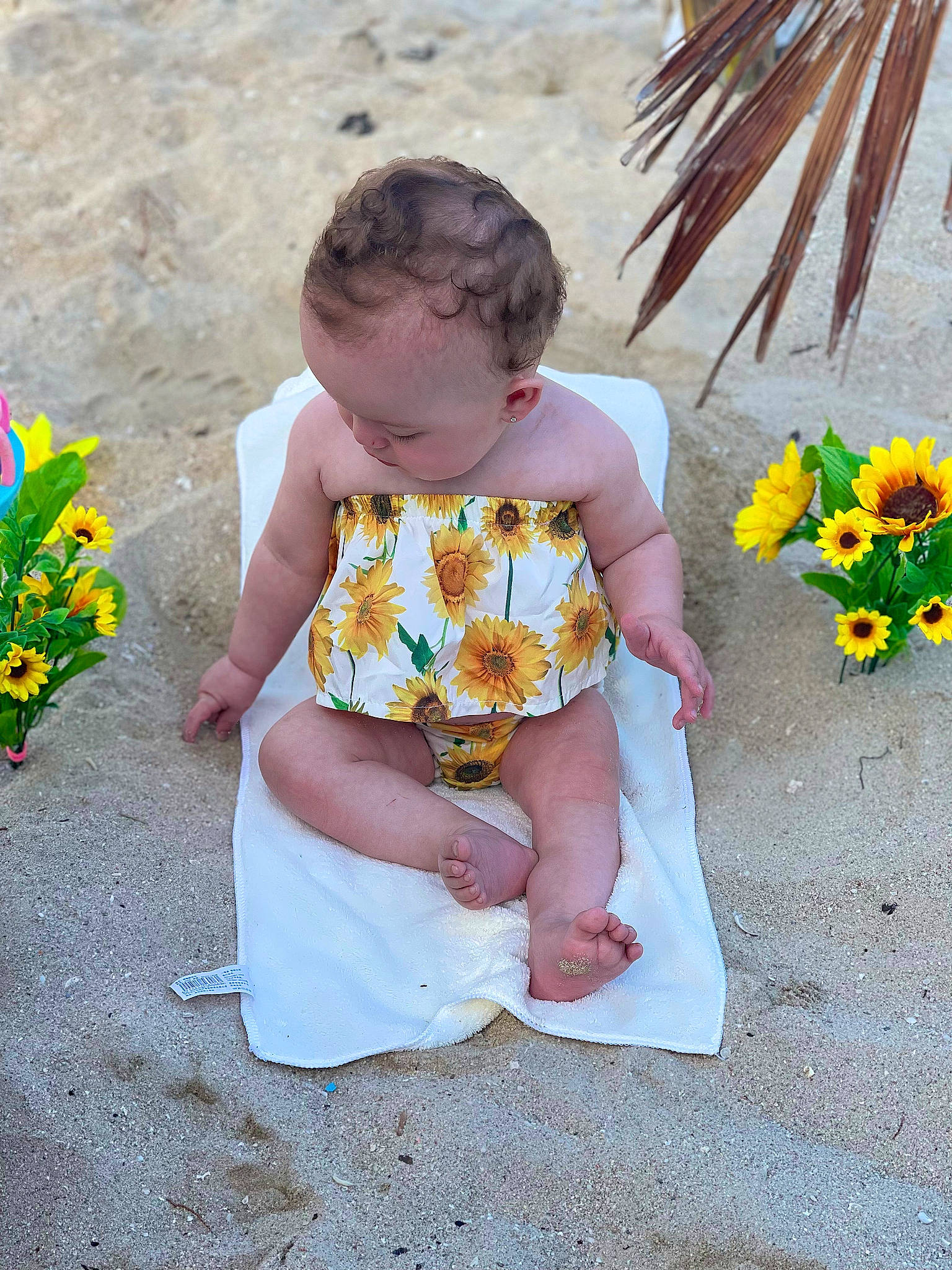 Amalia joined the competition — help win amazing prizes! baby, baby_toddler_clothing, child, dress, flower, flower_arranging, foot, fun, grass, happy, leaf, pattern, people_in_nature, person, petal, plant, play, sitting, skin, toddler