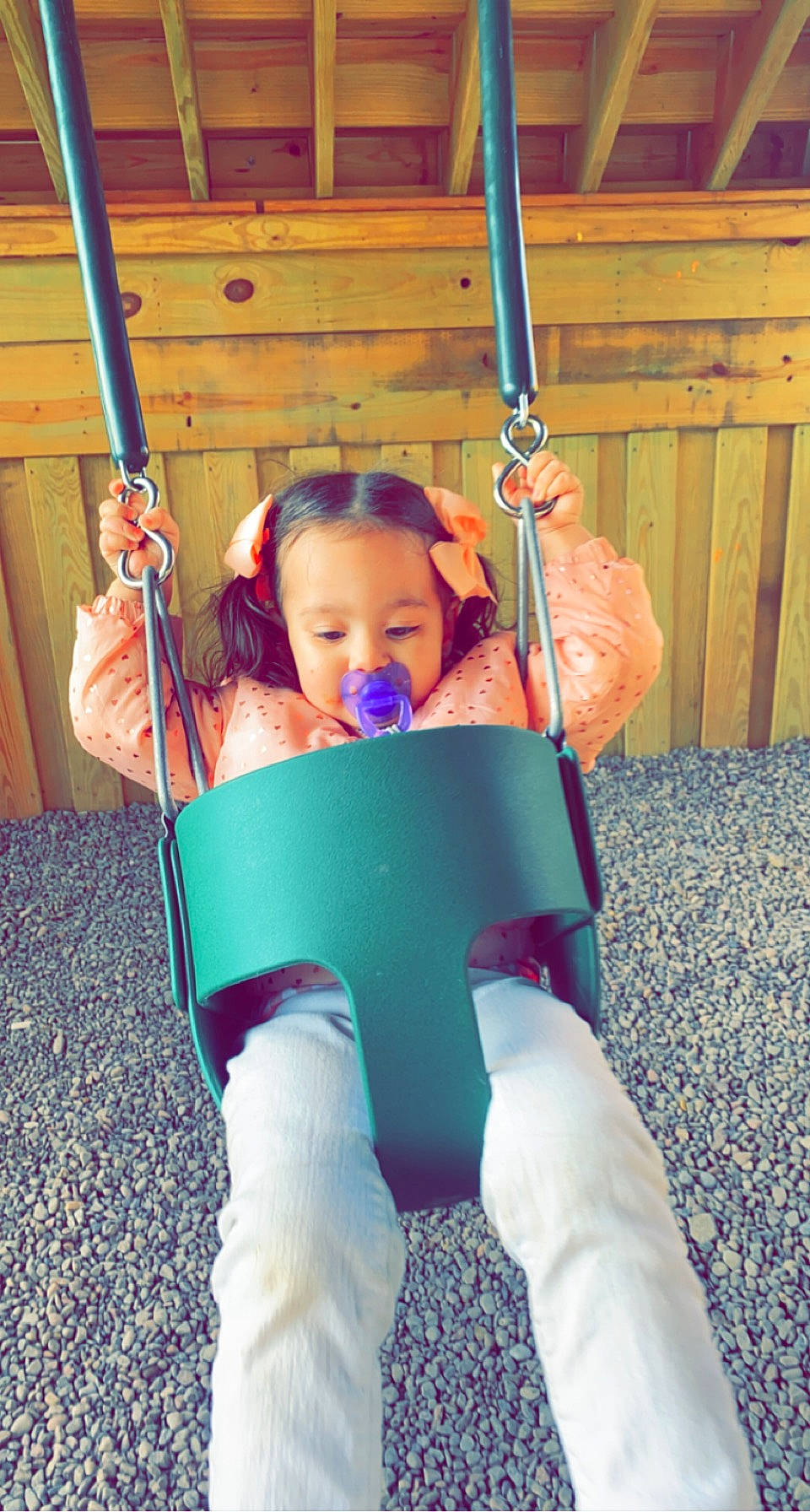 Zendaya is registered to the contest to win money with this photo: baby, baby_products, baby_toddler_clothing, child, city, electric_blue, fun, happy, head, leisure, outdoor_play_equipment, person, play, playground, recreation, sitting, smile, swing, toddler, tree