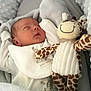Oakley joined the competition — help win amazing prizes! newborn, baby, sleeping, blanket, plush_toy, giraffe, soft, cozy, infant, cute, bed, comfort, child, white_clothing, peaceful, rest, portrait, indoors, nursery, toddler