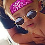 baby, child, face, person, adult, hand, sunglasses, bandana, indoor, window, skin, holding, closeup, portrait, filter, digital_effect, cute, expression, light, shadow