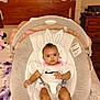 Akirra is registered to the contest to win money with this photo: baby, infant, baby_rocker, bunny_ears, onesie, pink, white_clothing, wooden_headboard, bedroom, dresser, plush_toy, minnie_mouse, floor, carpet, child, person, furniture, indoor, face, cute
