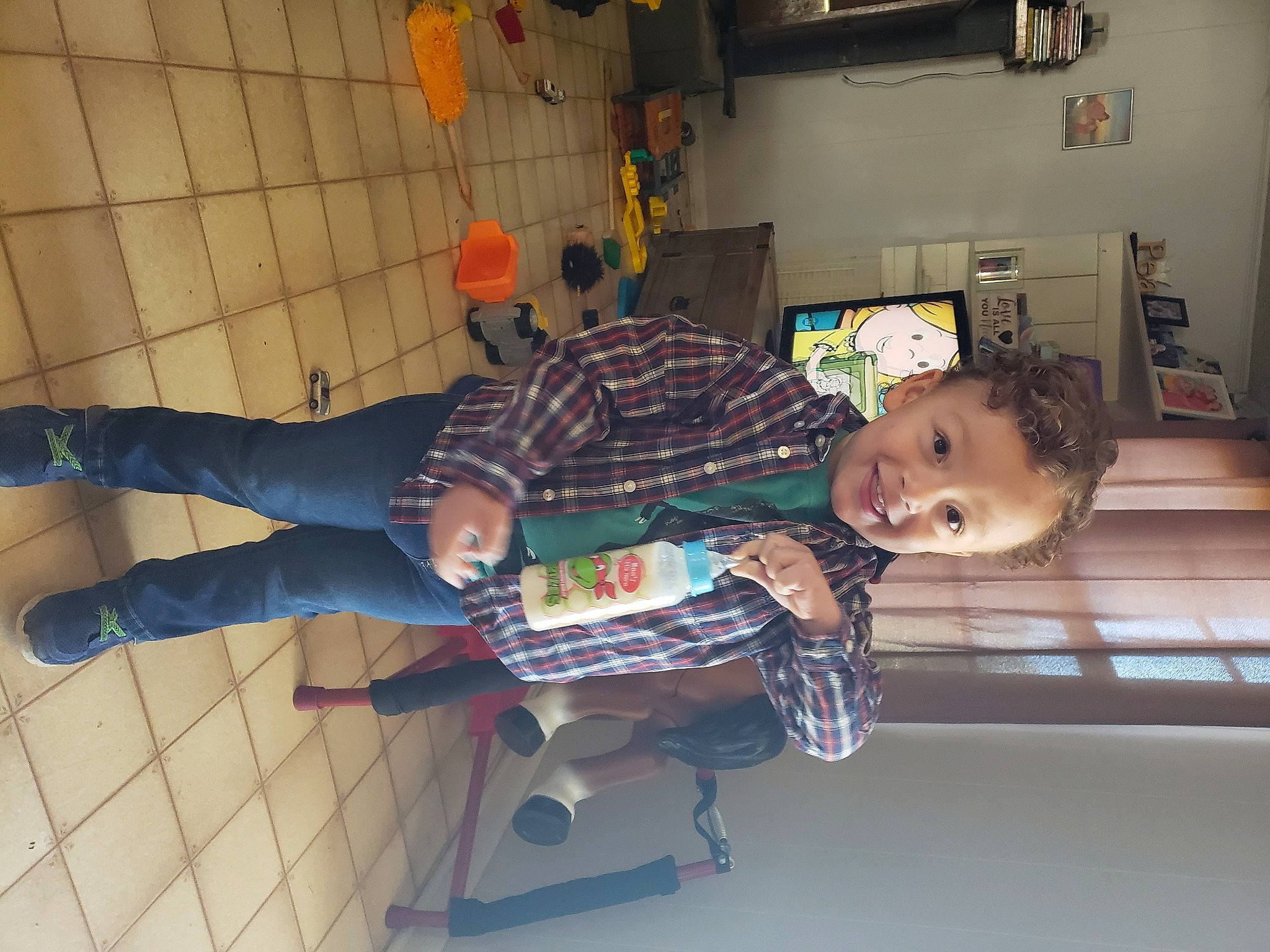 Cohen joined the competition — help win amazing prizes! baby, baby_toddler_clothing, child, flooring, fun, joy, pattern, person, room, shelf, sitting, smile, sock, toddler, walking_shoe