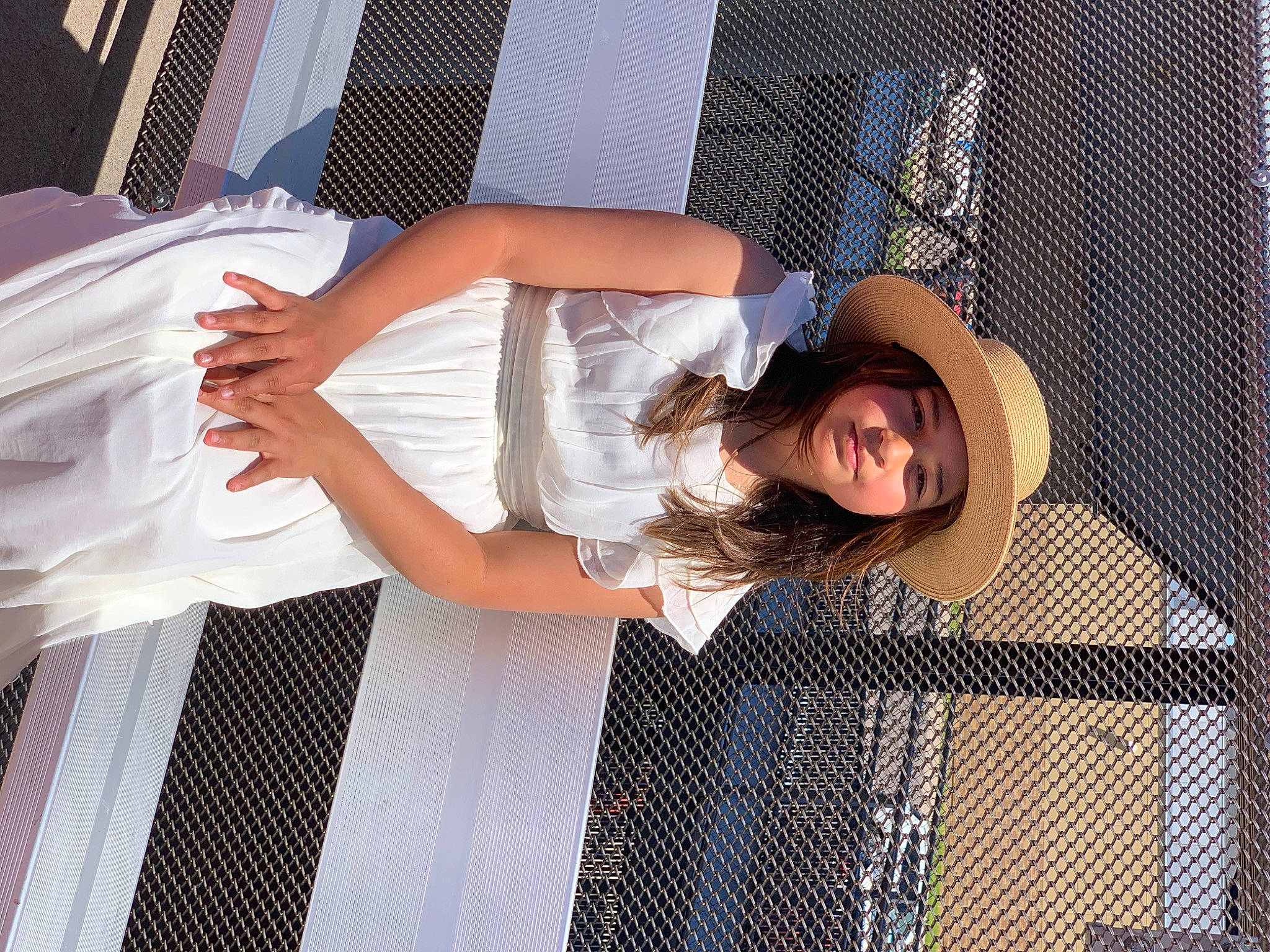 Ariannah is registered to the contest to win money with this photo: bridal_accessory, bridal_clothing, bridal_party_dress, bride, dress, elbow, facial_expression, fence, flash_photography, formal_wear, fun, gesture, gown, happy, headwear, human_body, person, shoulder, textile, thigh