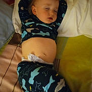 Ryan is registered to the contest to win money with this photo: baby, bed, blanket, blouse, bodypart, clothing, couch, cushion, face, finger, furniture, hand, head, homedecor, newborn, pants, person, photography, portrait, sleeping