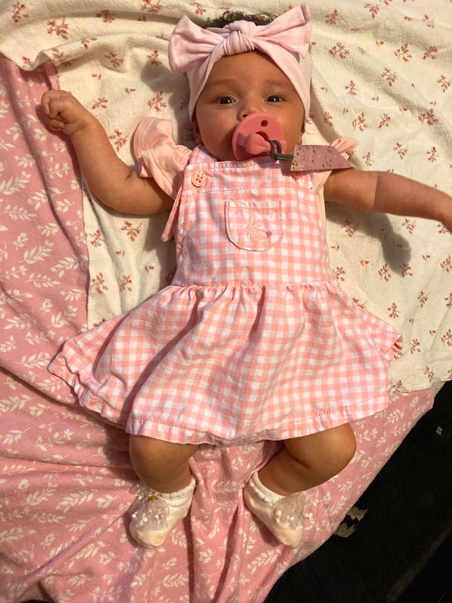 Izabella joined the competition — help win amazing prizes! baby, baby_toddler_clothing, child, dress, eye, eyelash, face, fashion_design, headwear, linens, lip, magenta, pattern, person, pink, plaid, skin, sleeve, tartan, textile