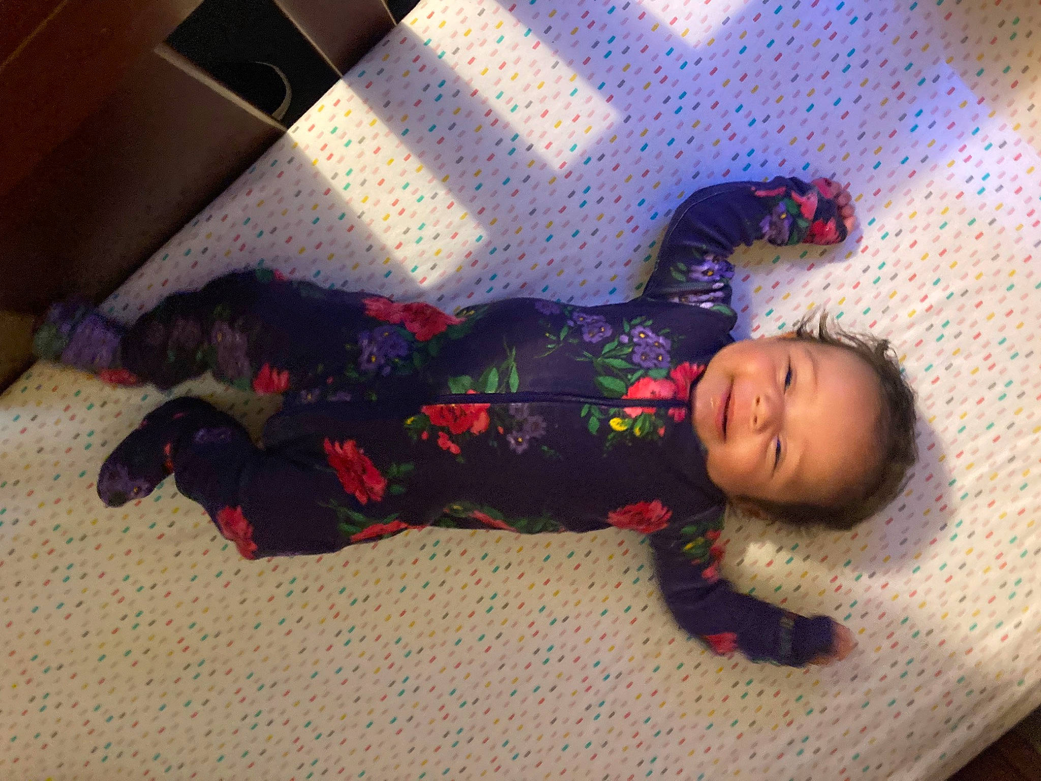 Izabella is registered to the contest to win money with this photo: baby, baby_toddler_clothing, carmine, child, comfort, computer_keyboard, floor, flooring, foot, fun, hardwood, human_leg, pattern, person, room, sitting, sock, toddler, wood