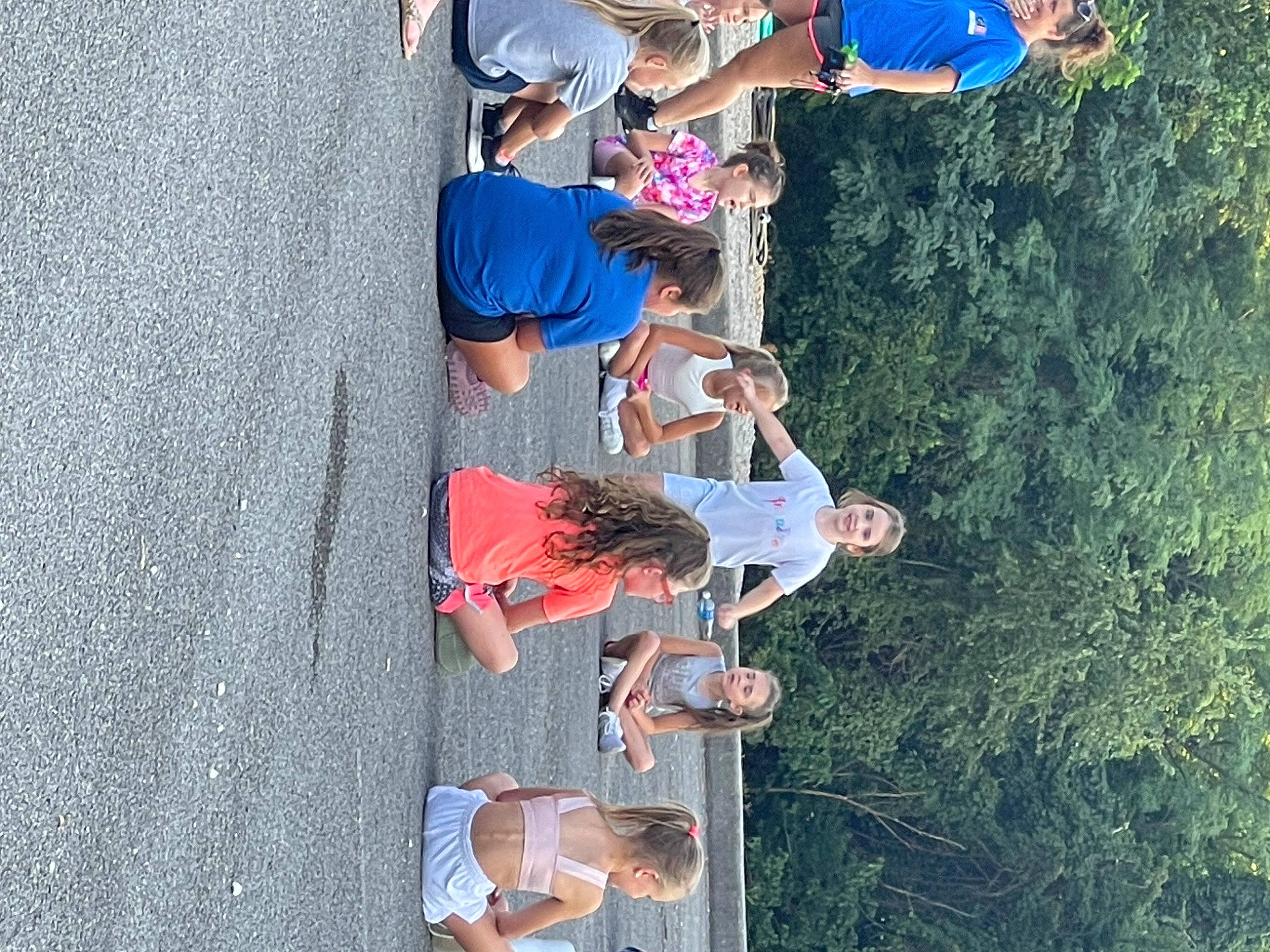 Genesis is registered to the contest to win money with this photo: adventure, asphalt, blue, concrete, electric_blue, event, fun, hat, landscape, leisure, person, recreation, t_shirt, tree, vacation, walking_shoe, wall