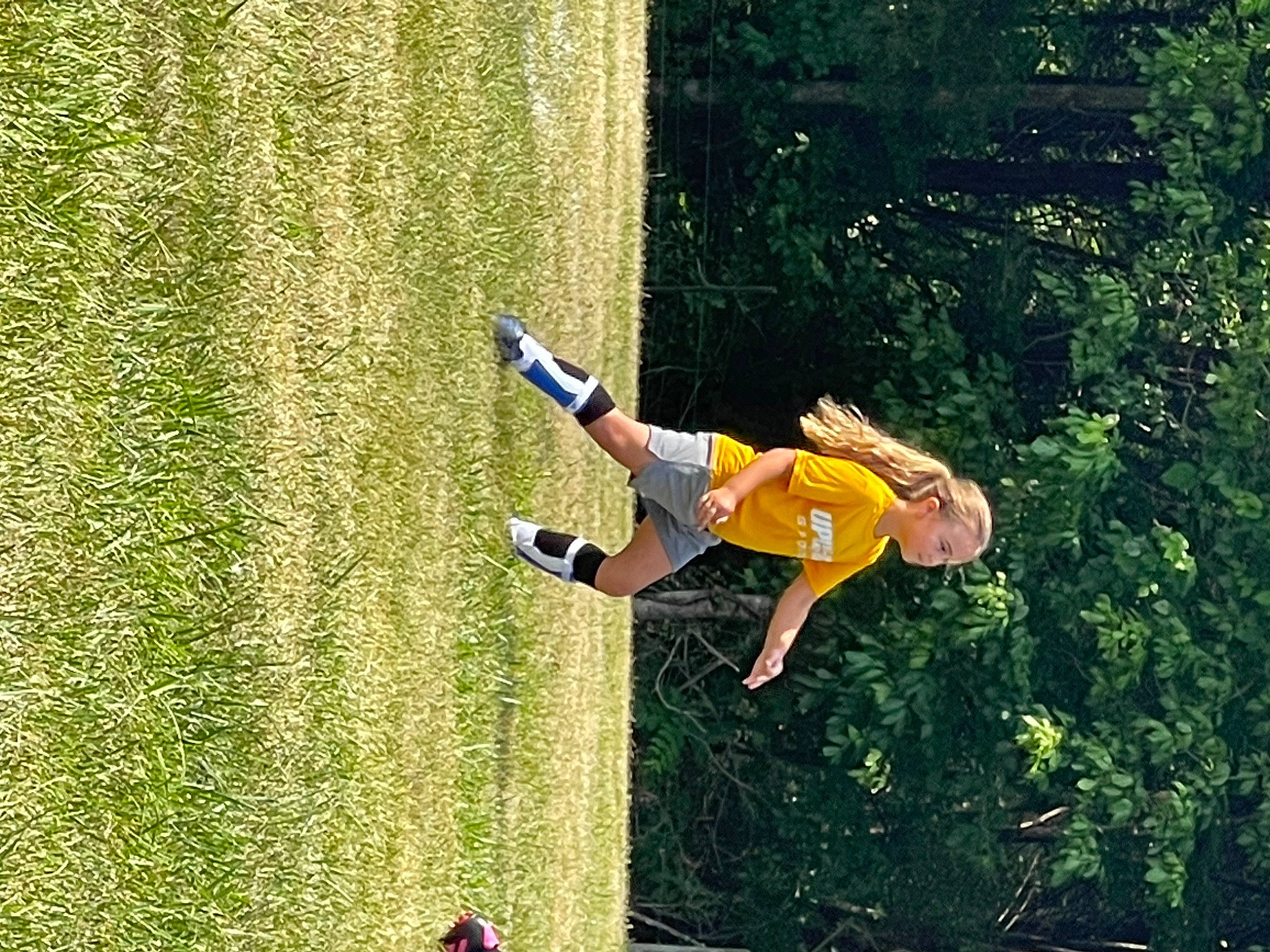 Paisley joined the competition — help win amazing prizes! adventure, balance, competition, competition_event, extreme_sport, fun, grass, jumping, landscape, leisure, people_in_nature, person, plant, player, recreation, rope, shorts, sports, tree