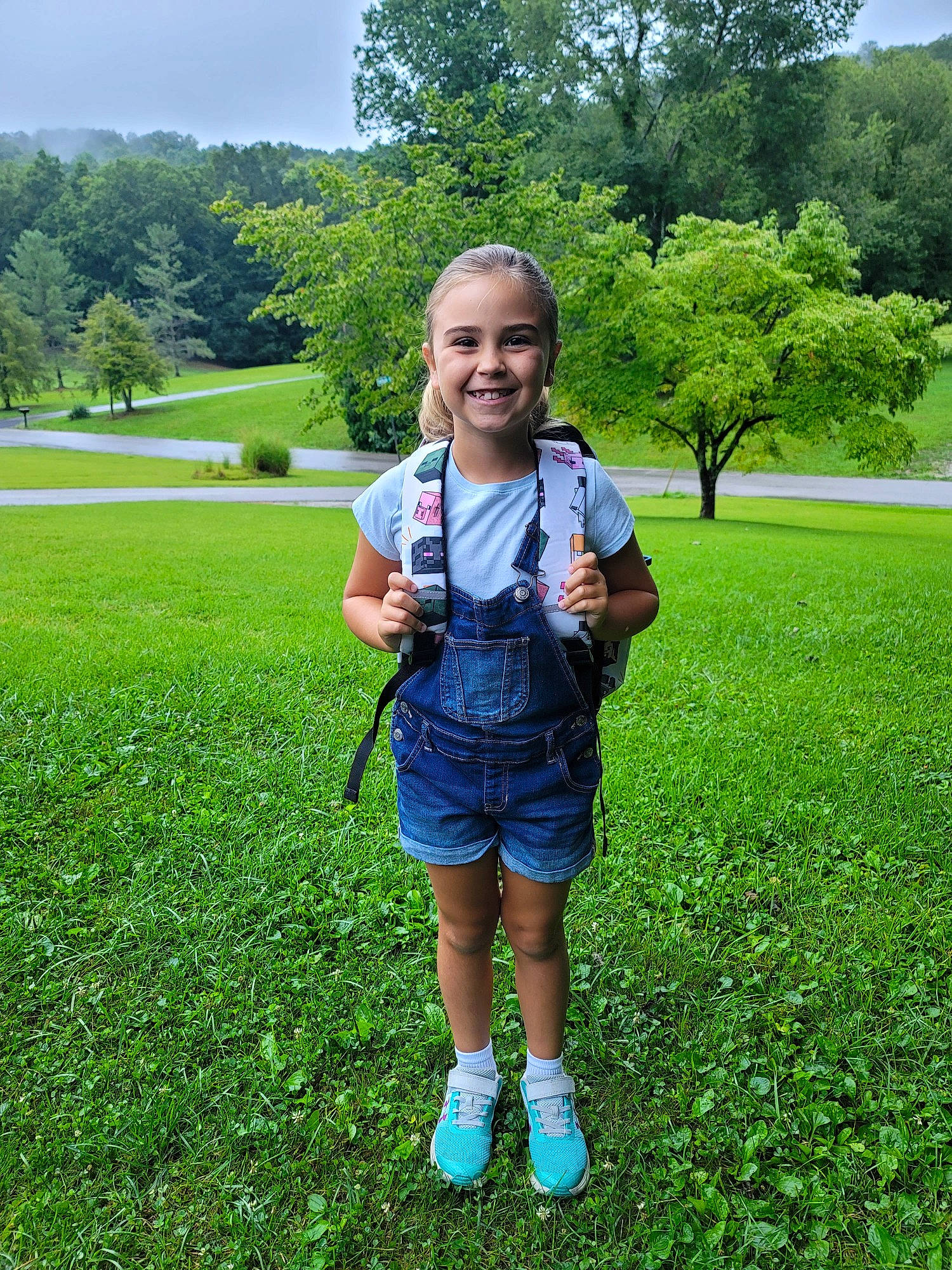 Paisley joined the competition — help win amazing prizes! botany, fun, grass, grass_family, grassland, green, happy, joy, leisure, meadow, natural_environment, natural_landscape, nature, people_in_nature, person, plant, recreation, shrub, sky, smile