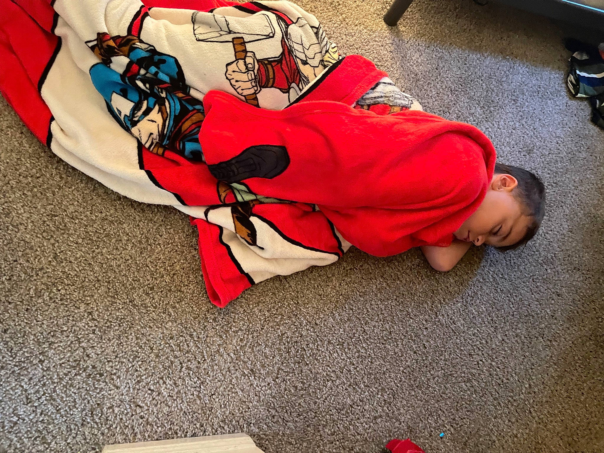 Ben joined the competition — help win amazing prizes! art, bag, carmine, carpet, comfort, fictional_character, flooring, human_leg, knee, luggage_and_bags, pattern, person, red, road_surface, sidewalk, sitting