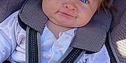 Kélia a rejoint le concours — aidez-le/la à gagner de superbes lots ! baby, blue_eyes, car_seat, child, clothing, cute, face, fashion, happy, infant, kid, onesie, person, portrait, seatbelt, smile, straps, toddler, white_clothing, young_child