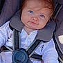 baby, blue_eyes, car_seat, child, clothing, cute, face, fashion, happy, infant, kid, onesie, person, portrait, seatbelt, smile, straps, toddler, white_clothing, young_child