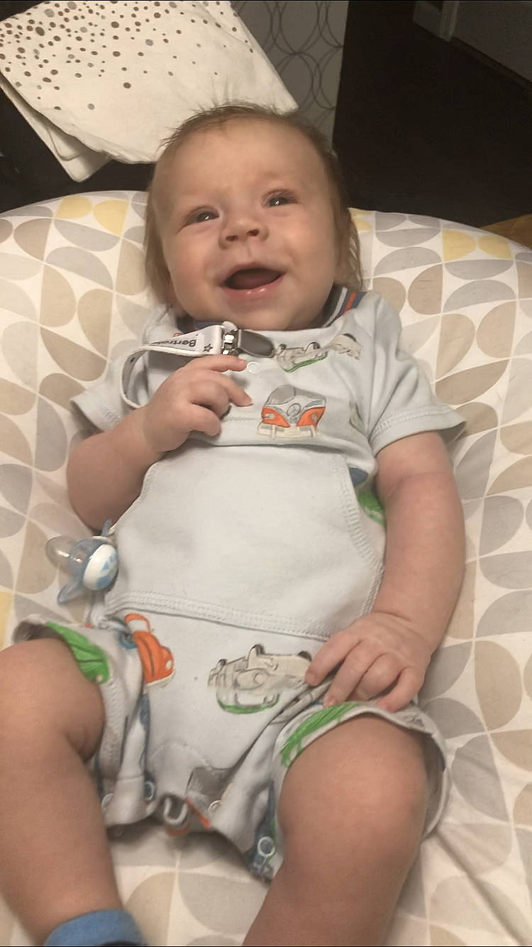 Linden is registered to the contest to win money with this photo: abdomen, arm, baby_products, cheek, child, day, ear, finger, hand, head, infant, leg, mouth, person, product, sitting, skin, smile, thigh, toddler