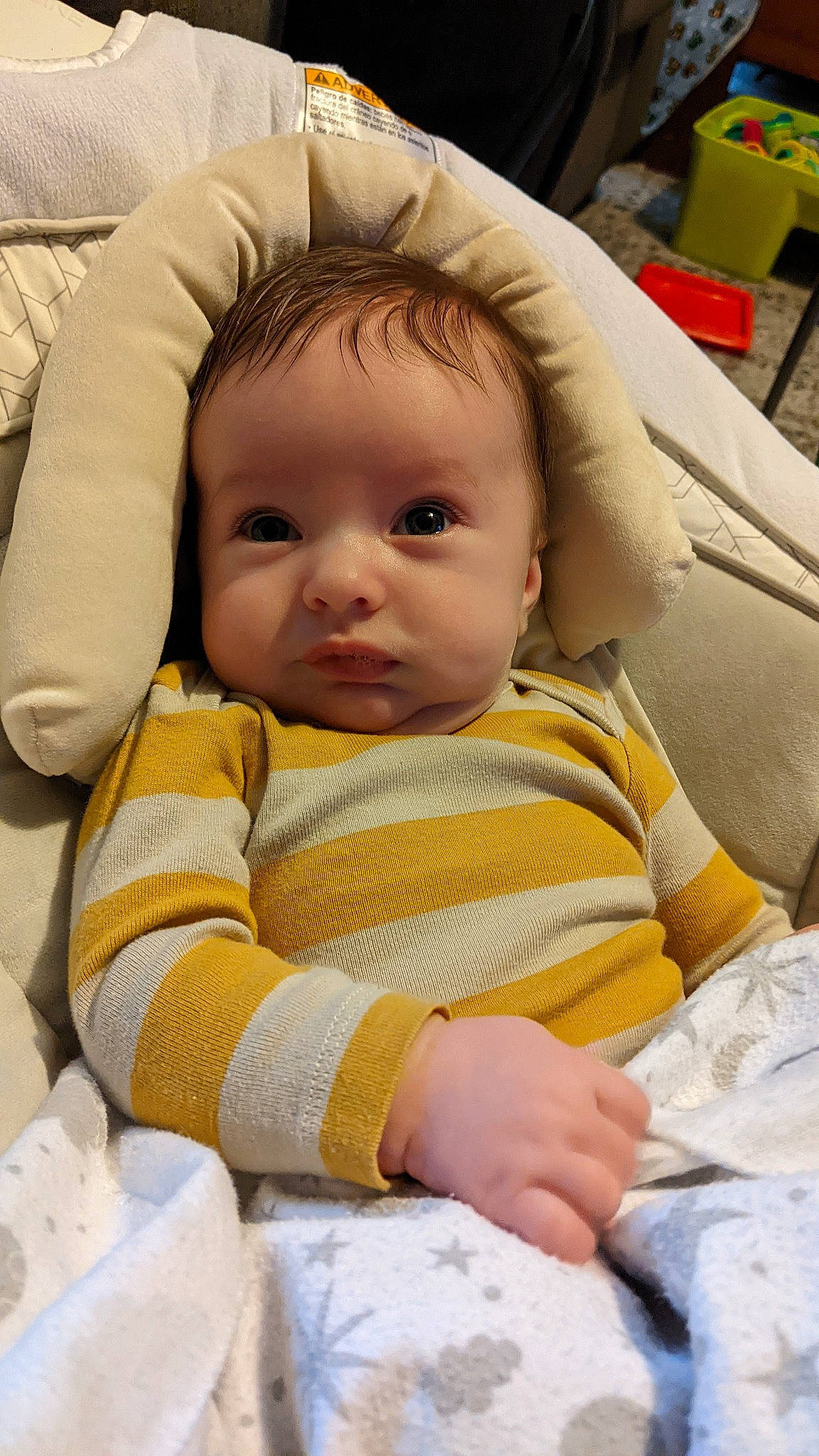 Charlie is registered to the contest to win money with this photo: baby, baby_toddler_clothing, cheek, child, chin, comfort, eye, eyebrow, face, facial_expression, head, iris, linens, mammal, mouth, nose, person, skin, sleeve, toddler