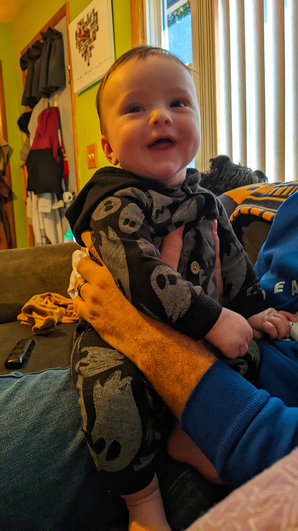 Charlie is registered to the contest to win money with this photo: baby, baby_toddler_clothing, bag, cheek, child, comfort, electric_blue, event, eye, face, gesture, happy, luggage_and_bags, pattern, person, sitting, skin, sleeve, smile, thumb