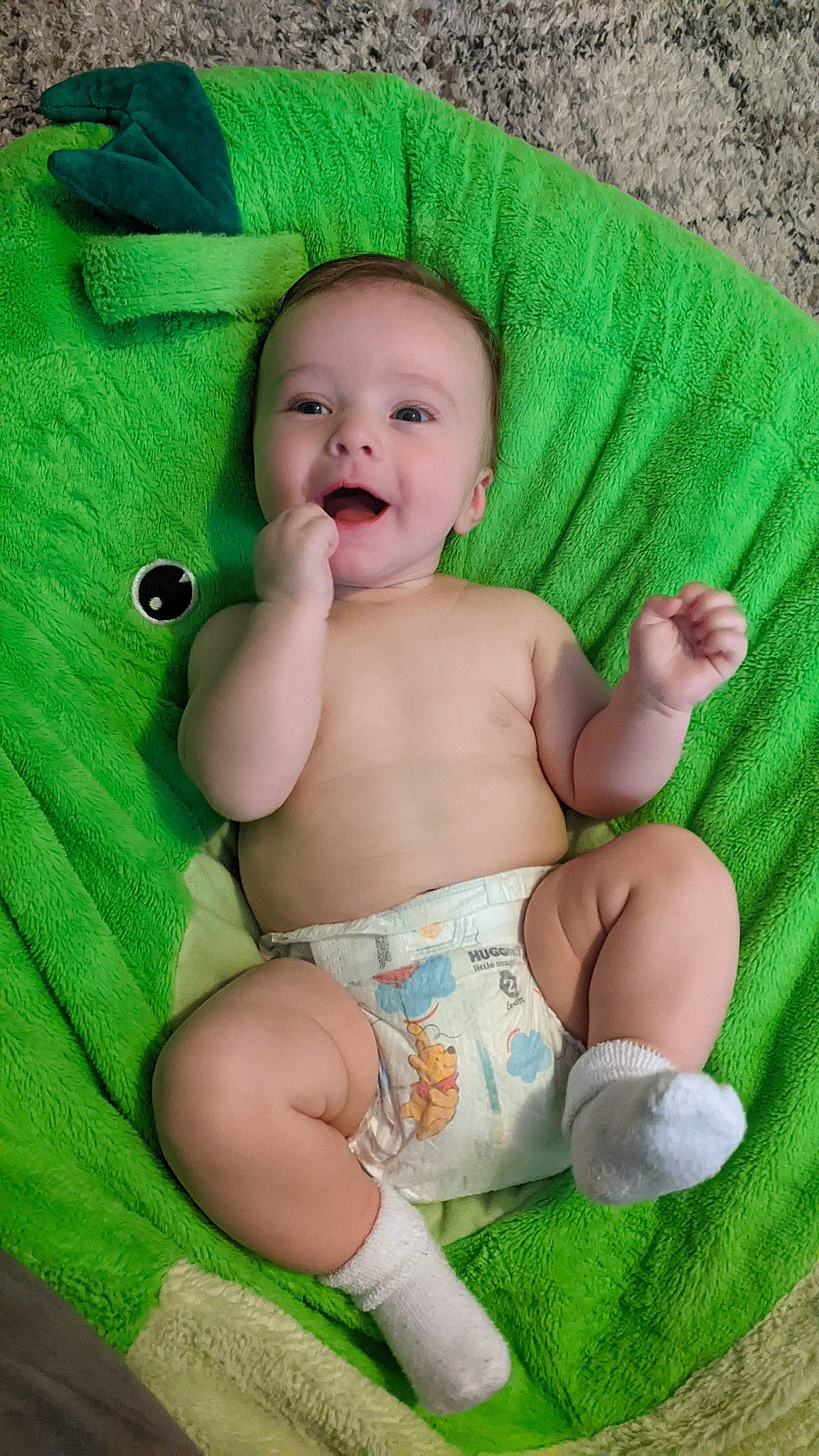 Charlie joined the competition — help win amazing prizes! baby, baby_products, baby_toddler_clothing, cheek, child, comfort, eye, face, finger, grass, green, happy, head, iris, person, skin, smile, textile, thigh, thumb