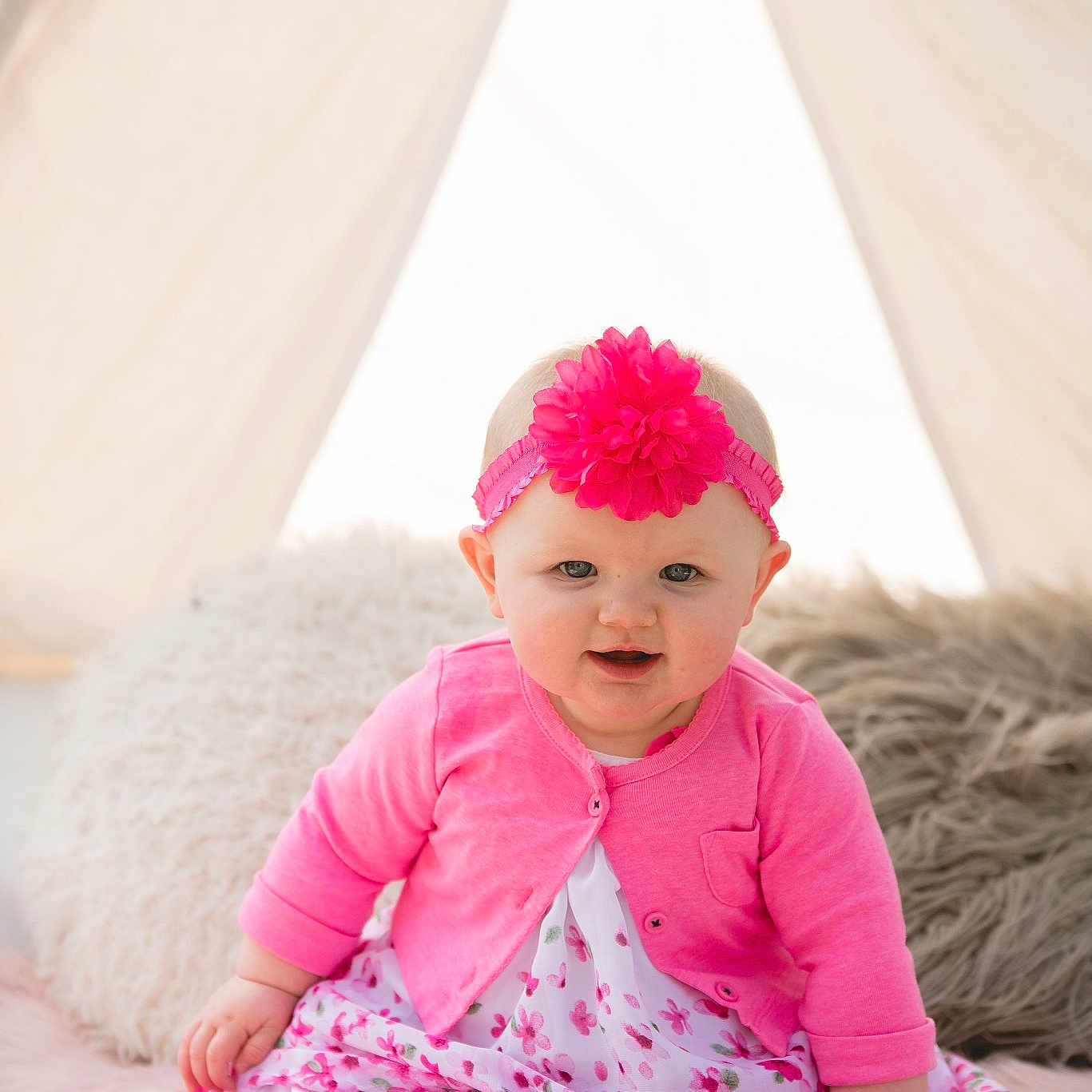Letti is registered to the contest to win money with this photo: baby, baby_toddler_clothing, child, child_model, fur, hair_accessory, head, headgear, outerwear, person, photograph, pink, play, portrait_photography, skin, smile, textile, toddler