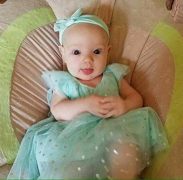 Audrey joined the competition — help win amazing prizes! baby, baby_products, baby_sleeping, baby_toddler_clothing, child, eye, face, fictional_character, hair_accessory, head, iris, person, product, skin, smile, toddler, turquoise