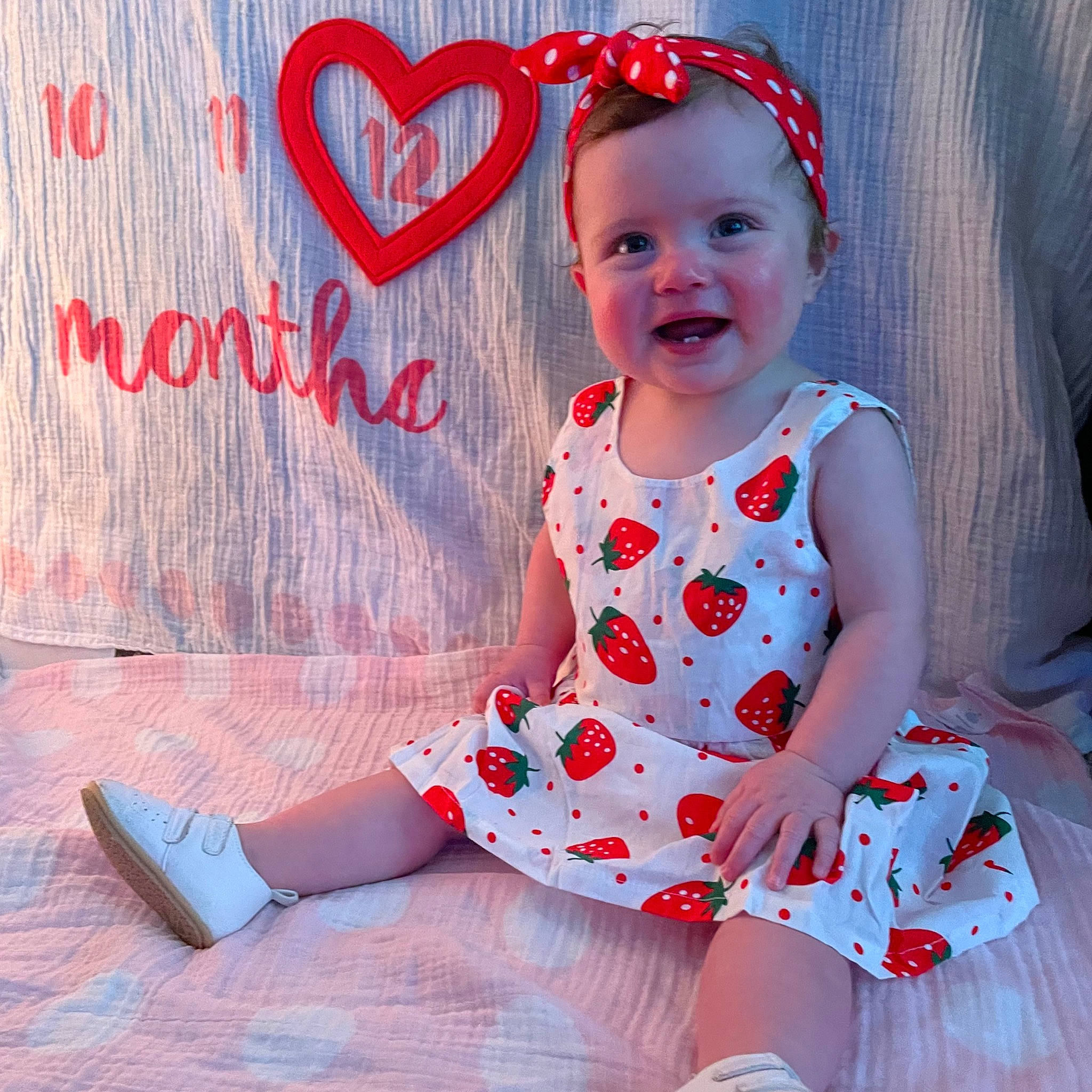 Scarlett is registered to the contest to win money with this photo: baby, baby_toddler_clothing, child, cool, day_dress, dress, event, facial_expression, happy, hat, magenta, one_piece_garment, pattern, person, pink, red, skin, sleeve, smile, t_shirt