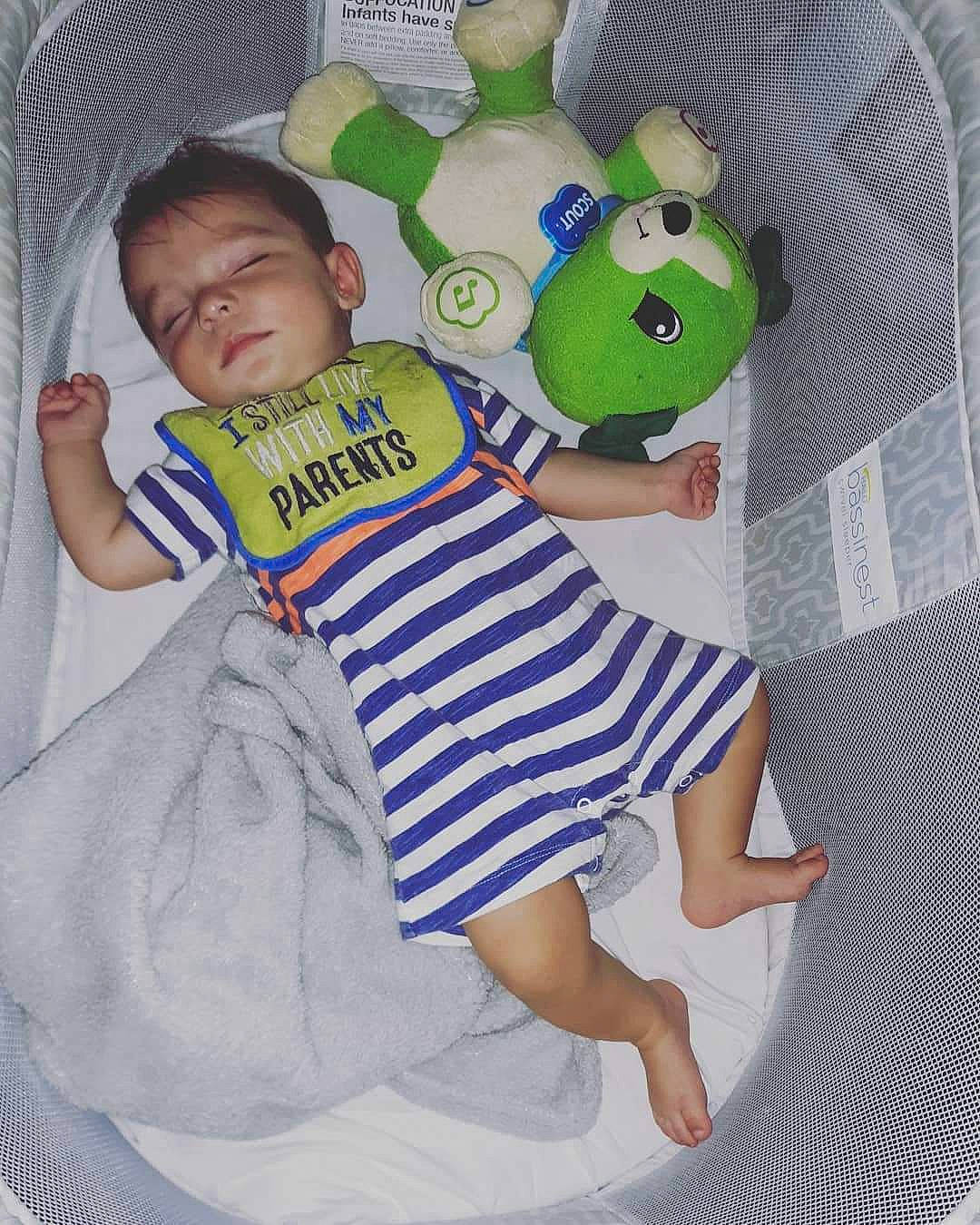 Conrad is registered to the contest to win money with this photo: baby, baby_products, baby_safety, baby_toddler_clothing, child, green, linens, person, product, sleeve, textile, toddler
