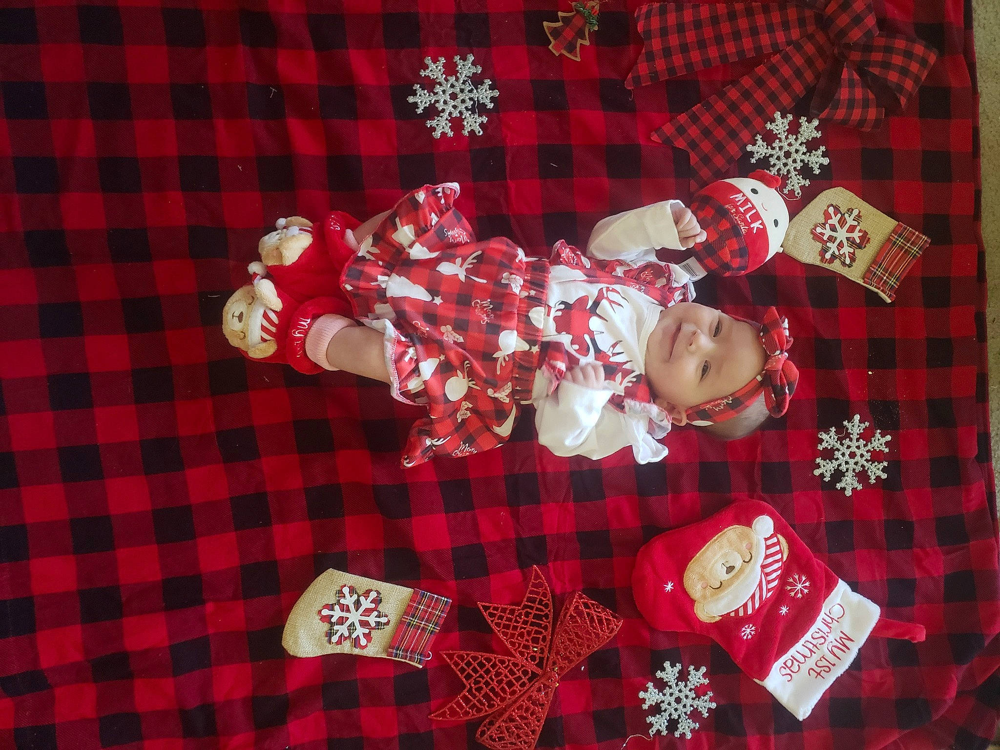 Lilith joined the competition — help win amazing prizes! baby, baby_toddler_clothing, carmine, child, christmas, christmas_decoration, christmas_eve, event, hat, headwear, holiday, joy, linens, pattern, person, plaid, plant, red, sleeve, sock