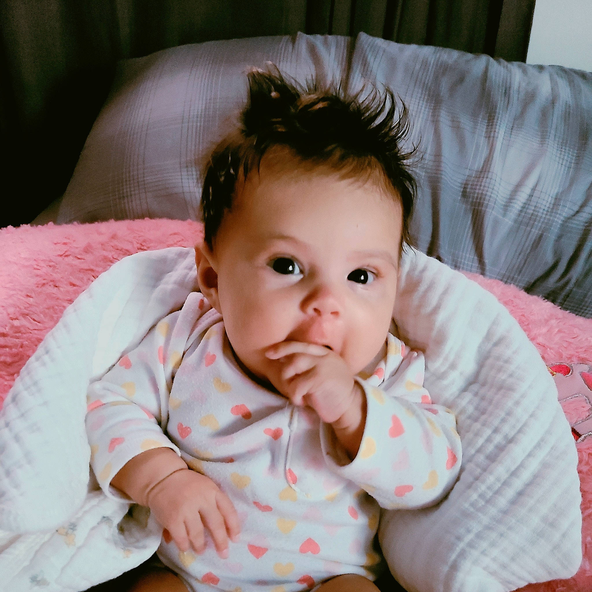 Lucia is registered to the contest to win money with this photo: baby, beauty, cheek, child, ear, eye, face, head, iris, lip, mouth, nose, person, sitting, skin, smile, textile, toddler